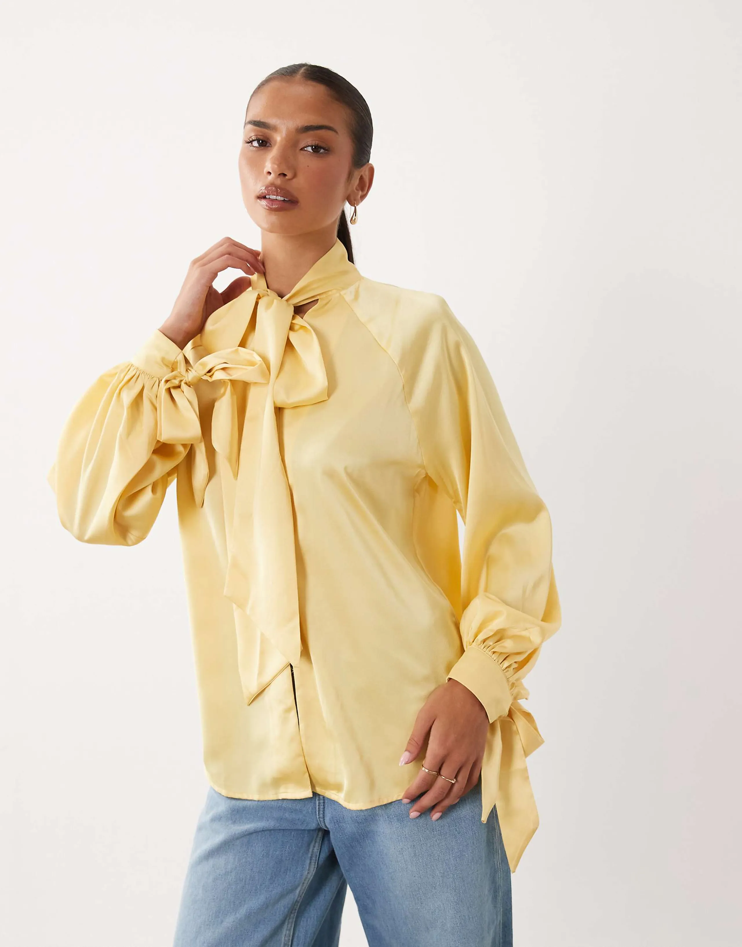 ASOS DESIGN satin tie cuff tie neck button down blouse in buttermilk