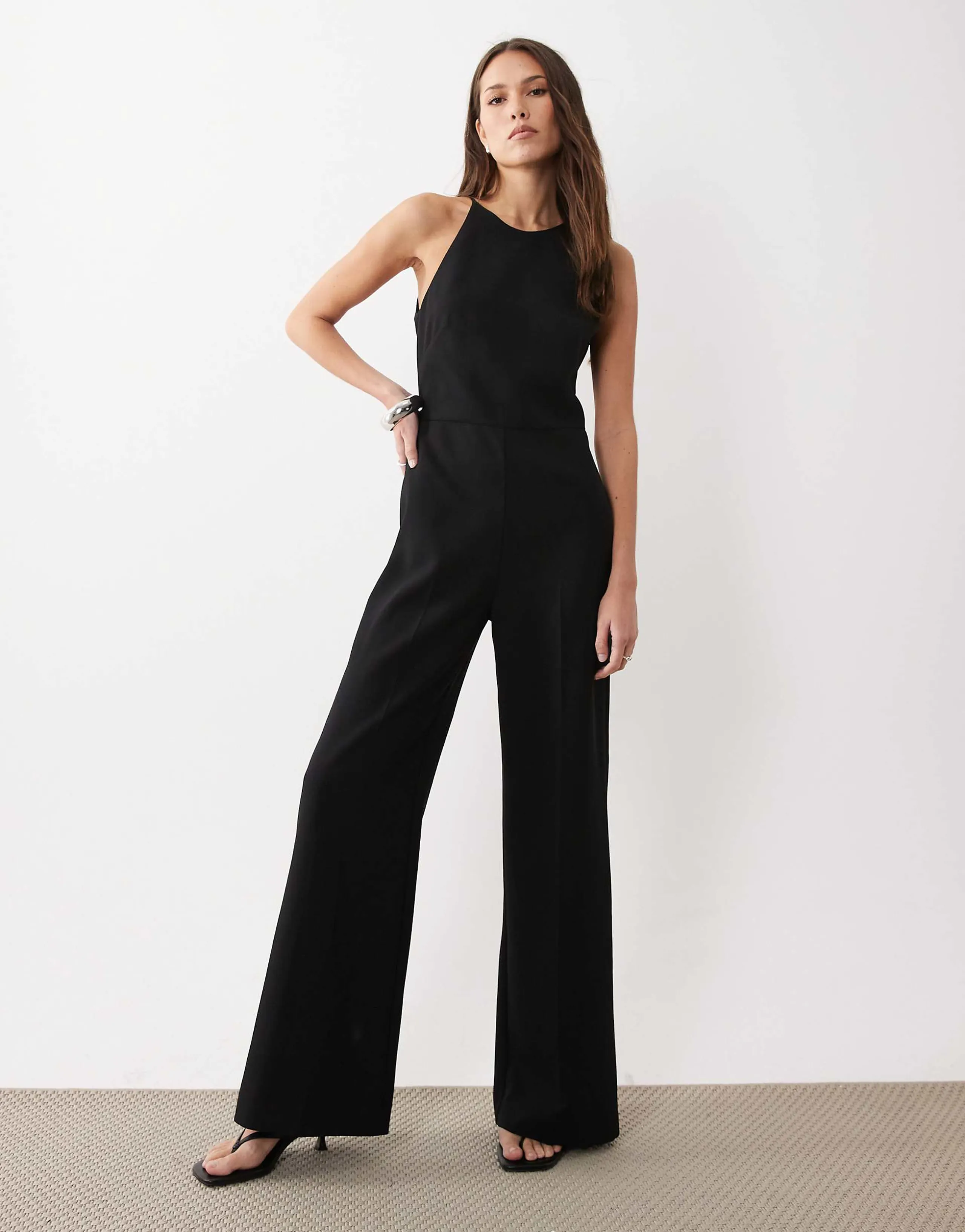 Mango halterneck backless jumpsuit in black