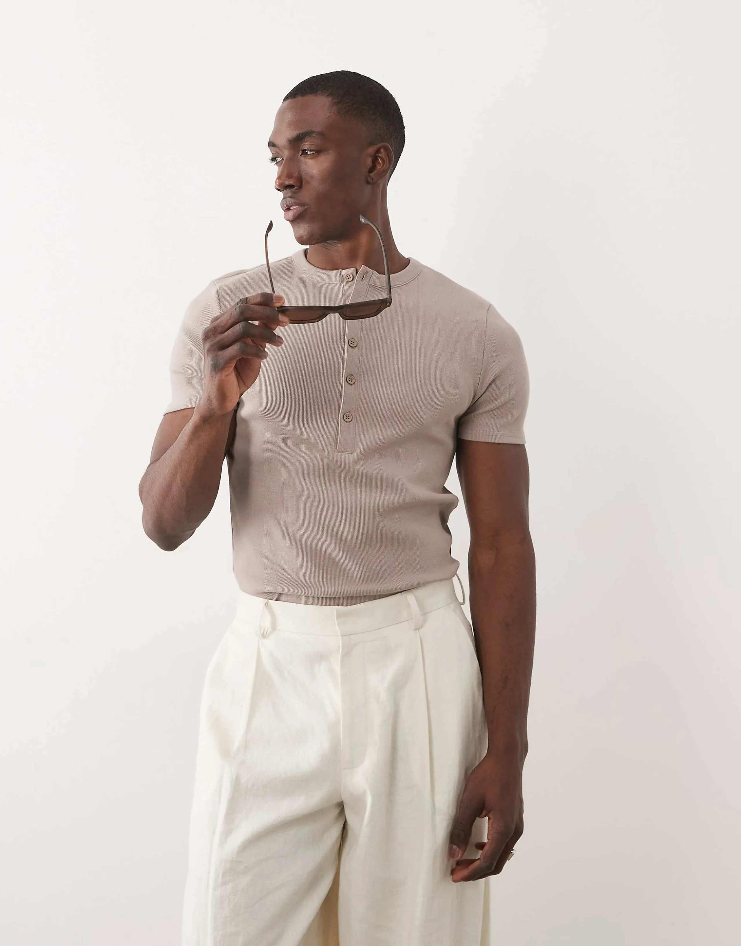 ASOS DESIGN muscle fit T-shirt with henley neck in beige rib 