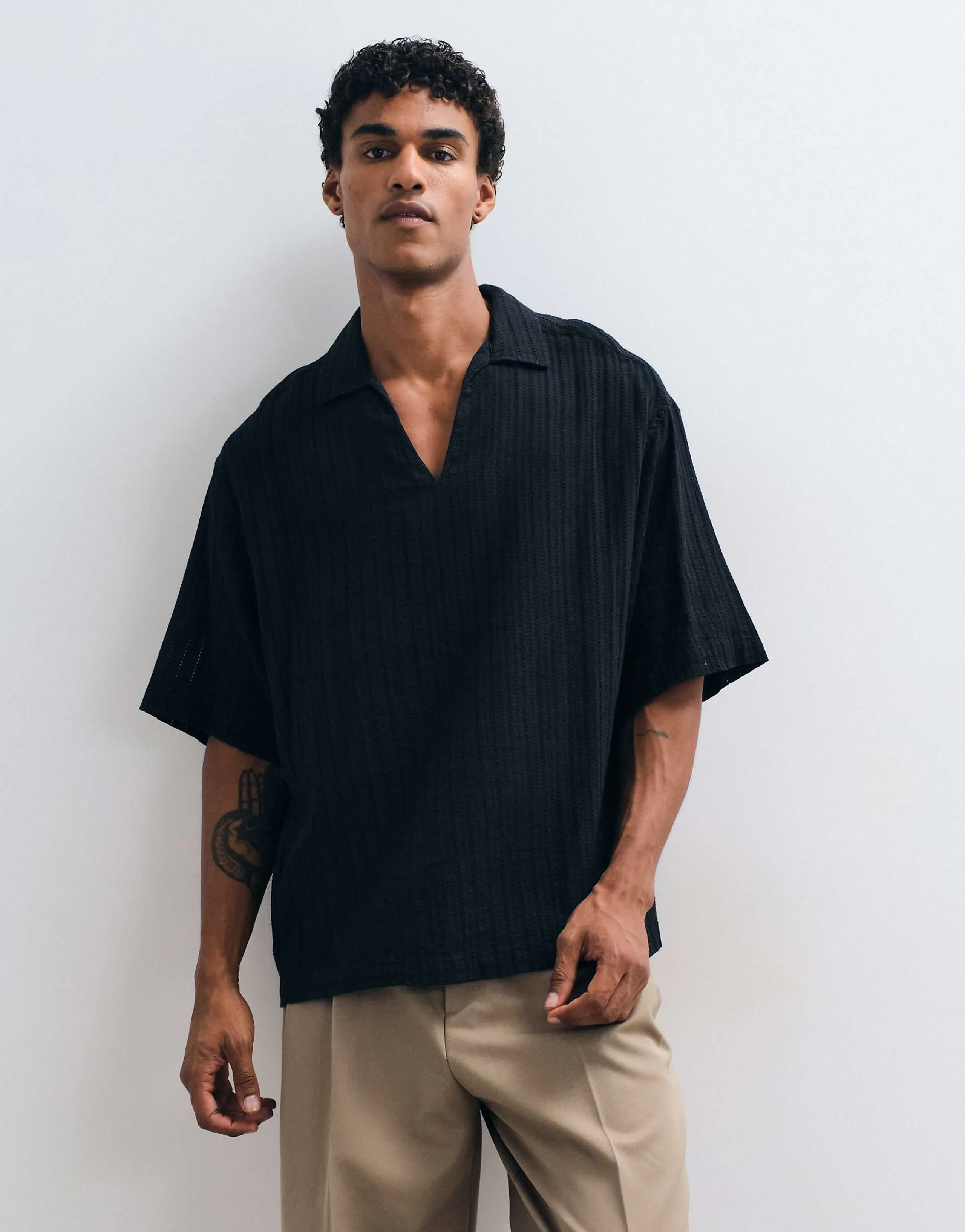 ASOS DESIGN oversized over the head eyelet shirt in black