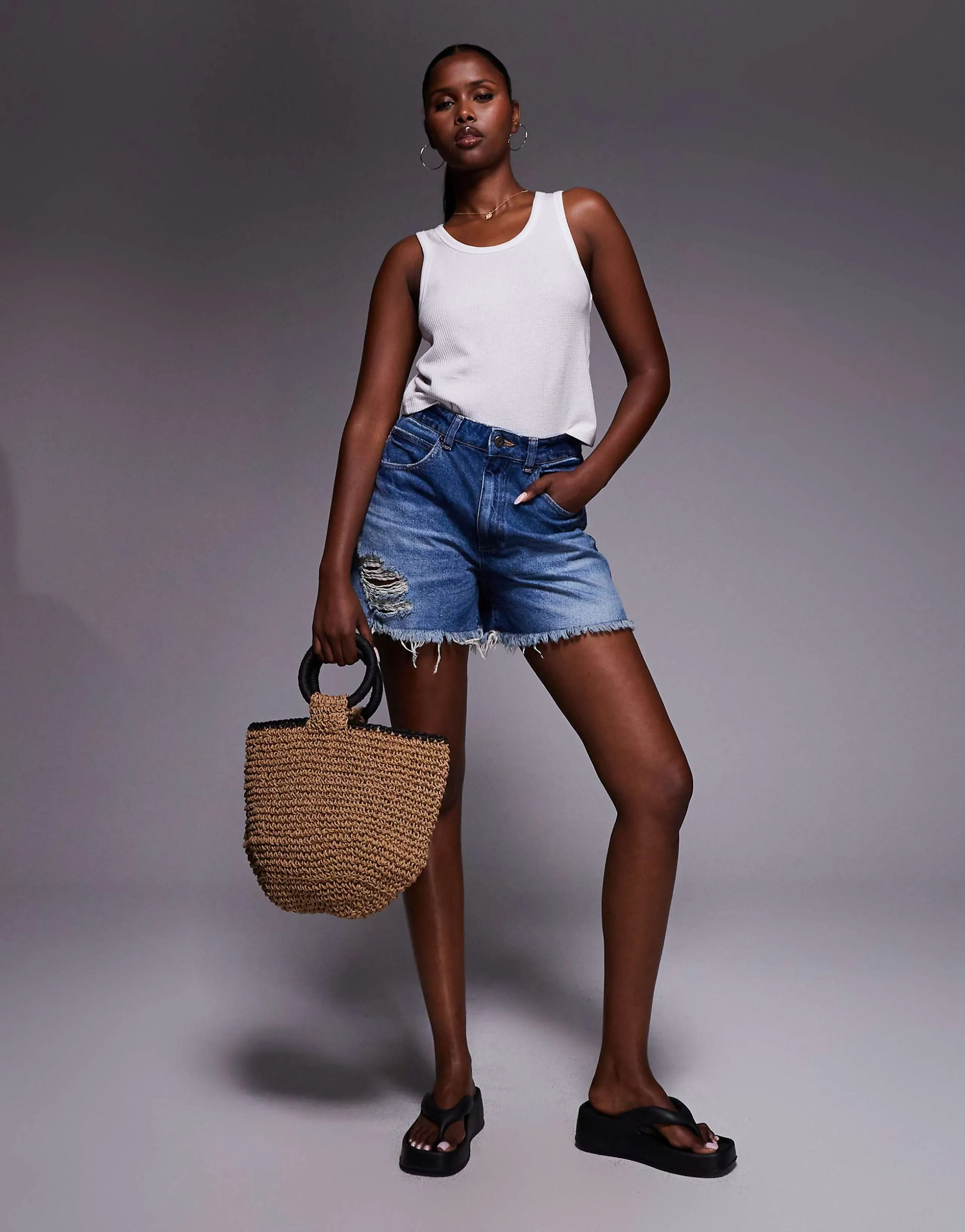 ASOS DESIGN denim longline A line short in dark midwash with rip hem