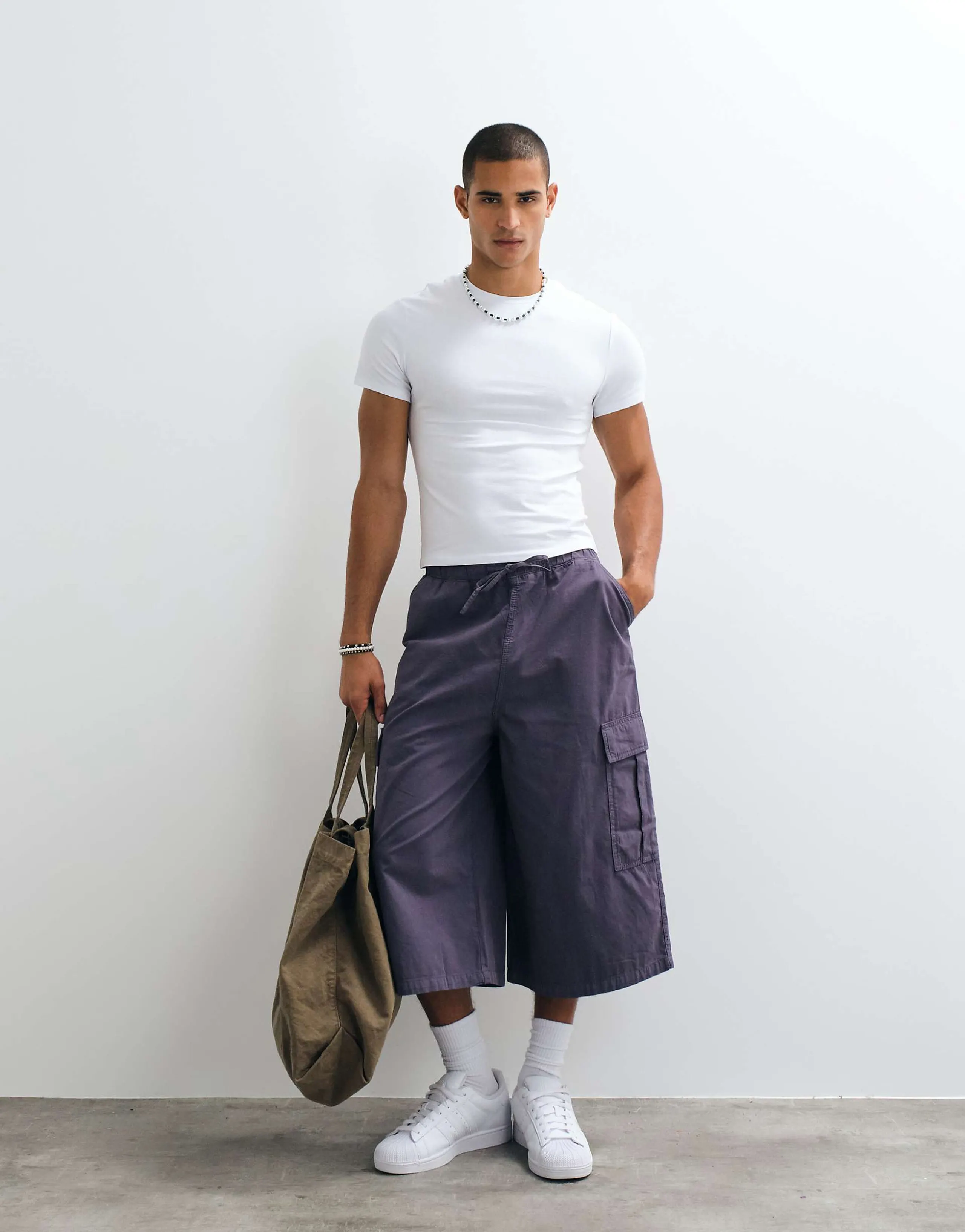 COLLUSION longline jorts in plum