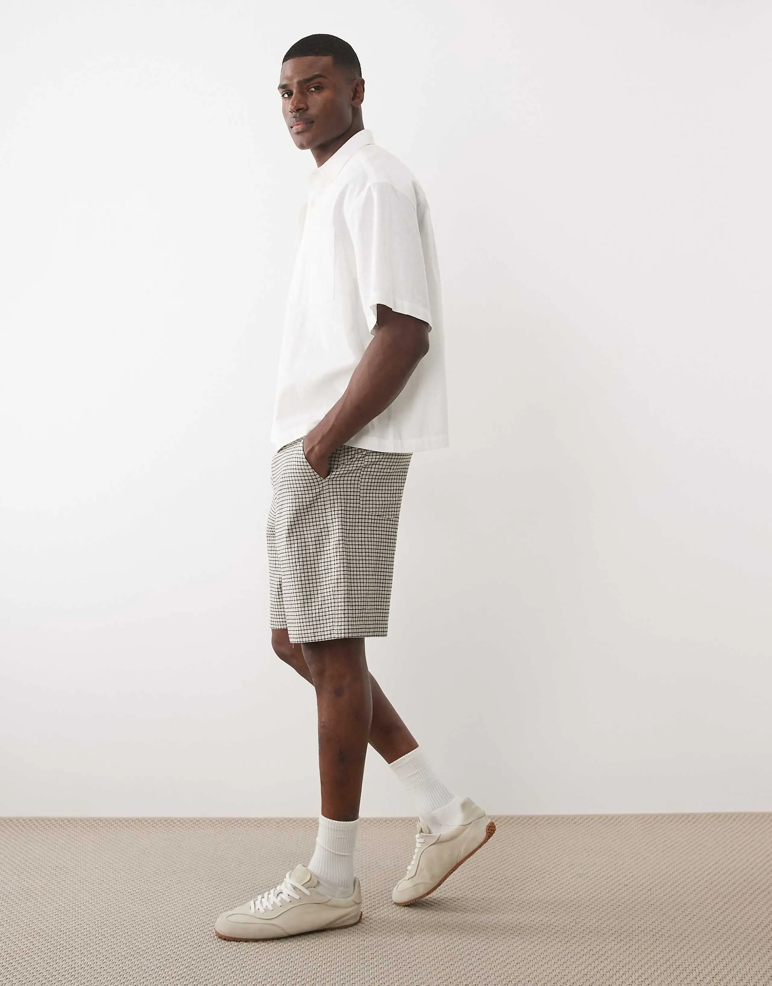 ASOS DESIGN mid length jorts with pleat & tie styling in plaid fabric