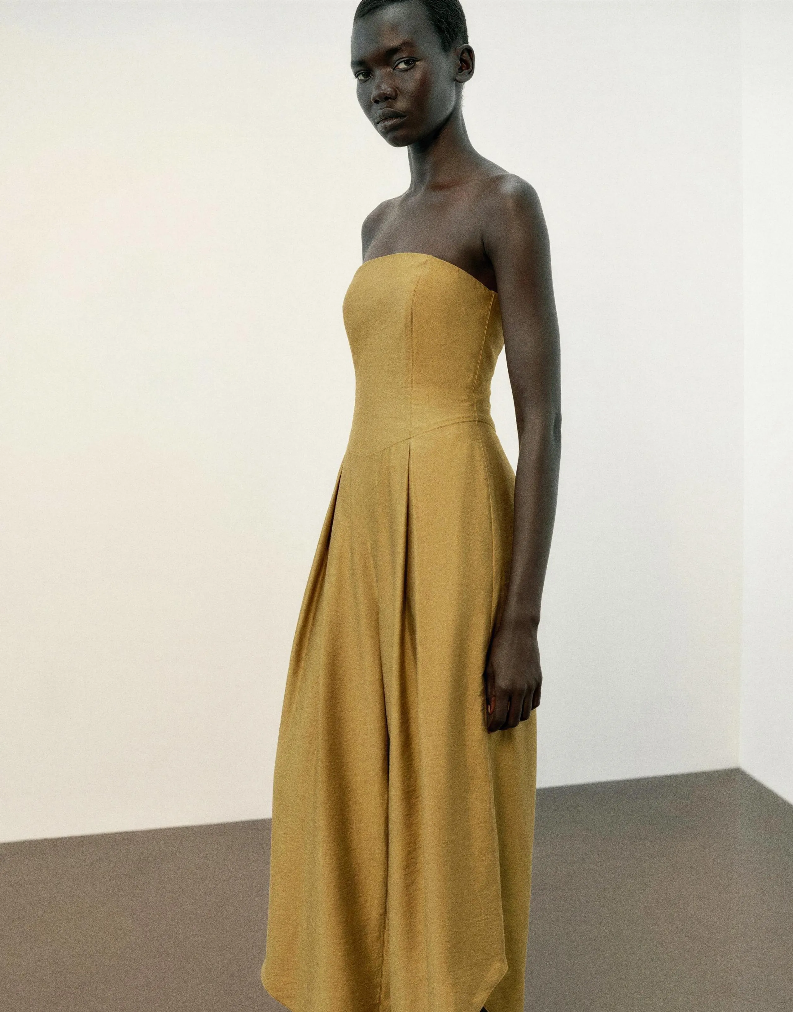 ASYMMETRIC HEM JUMPSUIT