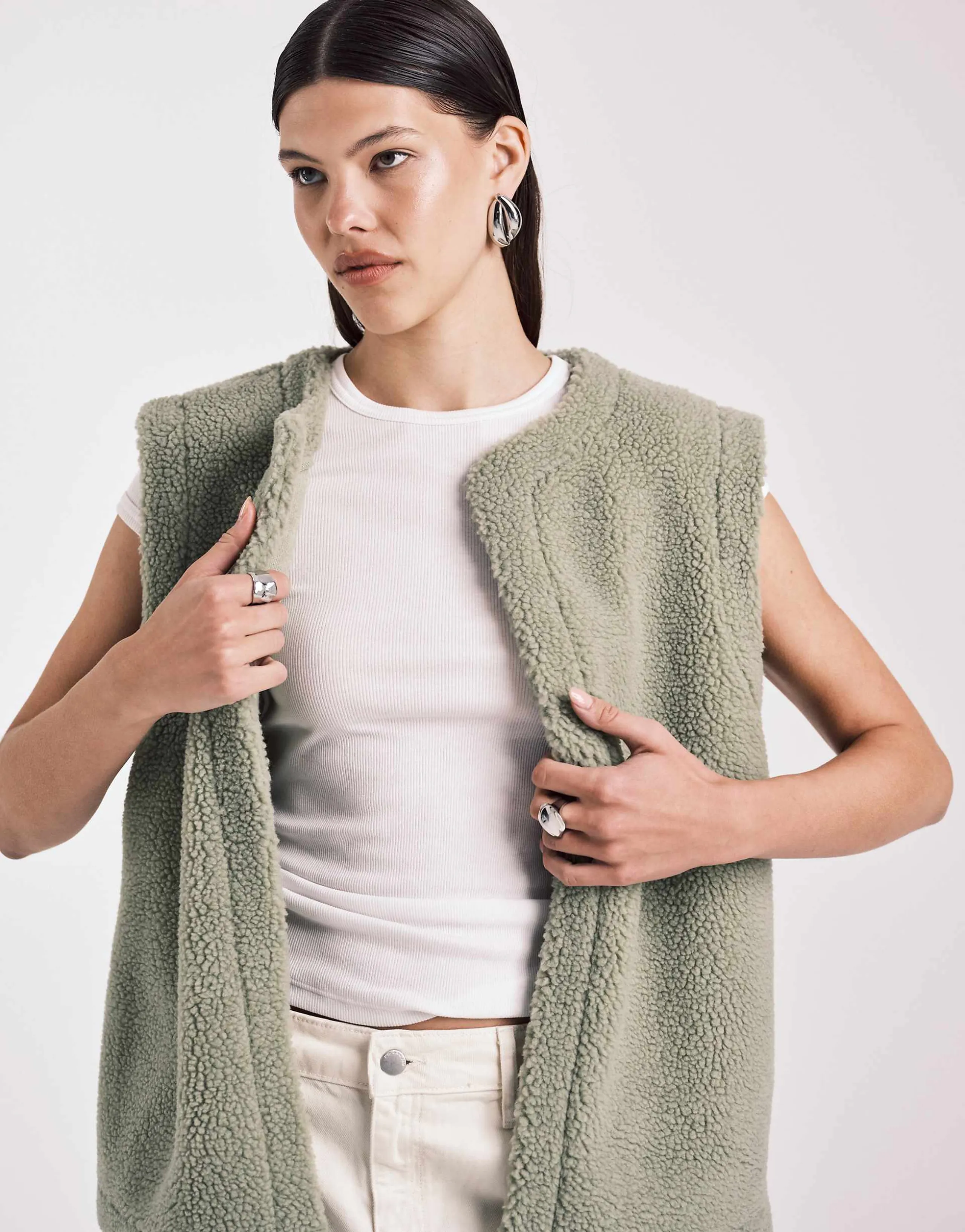ASOS DESIGN borg fleece vest in green