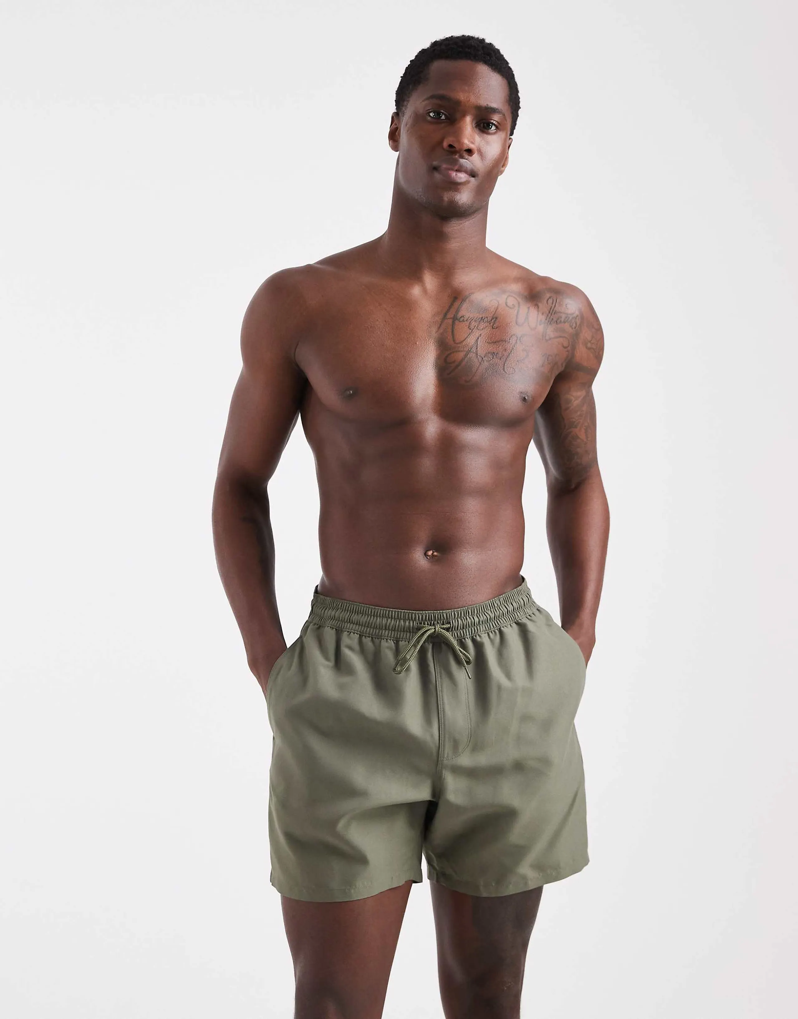 ASOS DESIGN swim shorts in mid length in khaki