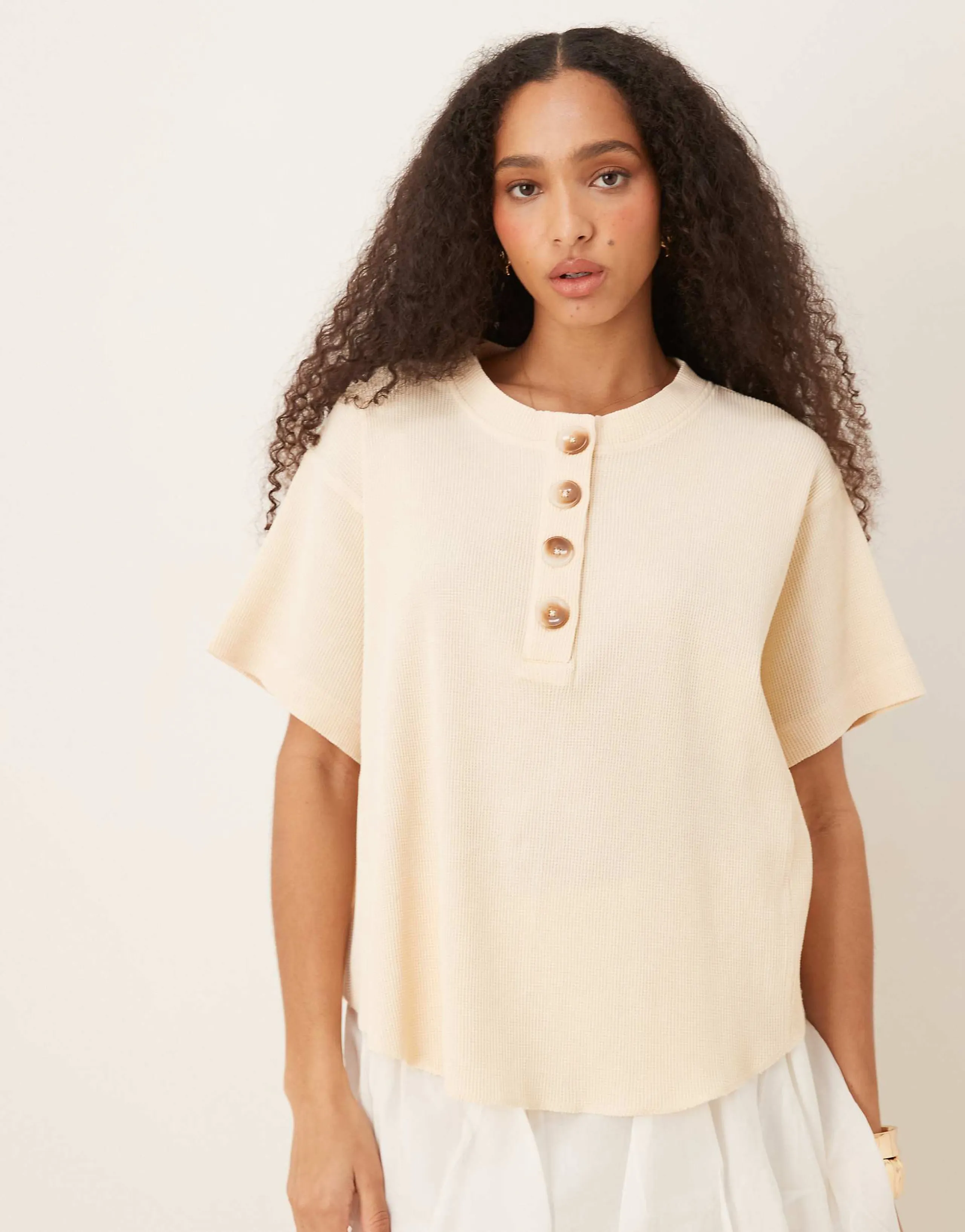 ASOS DESIGN heavy waffle knit short sleeve henley top in cream