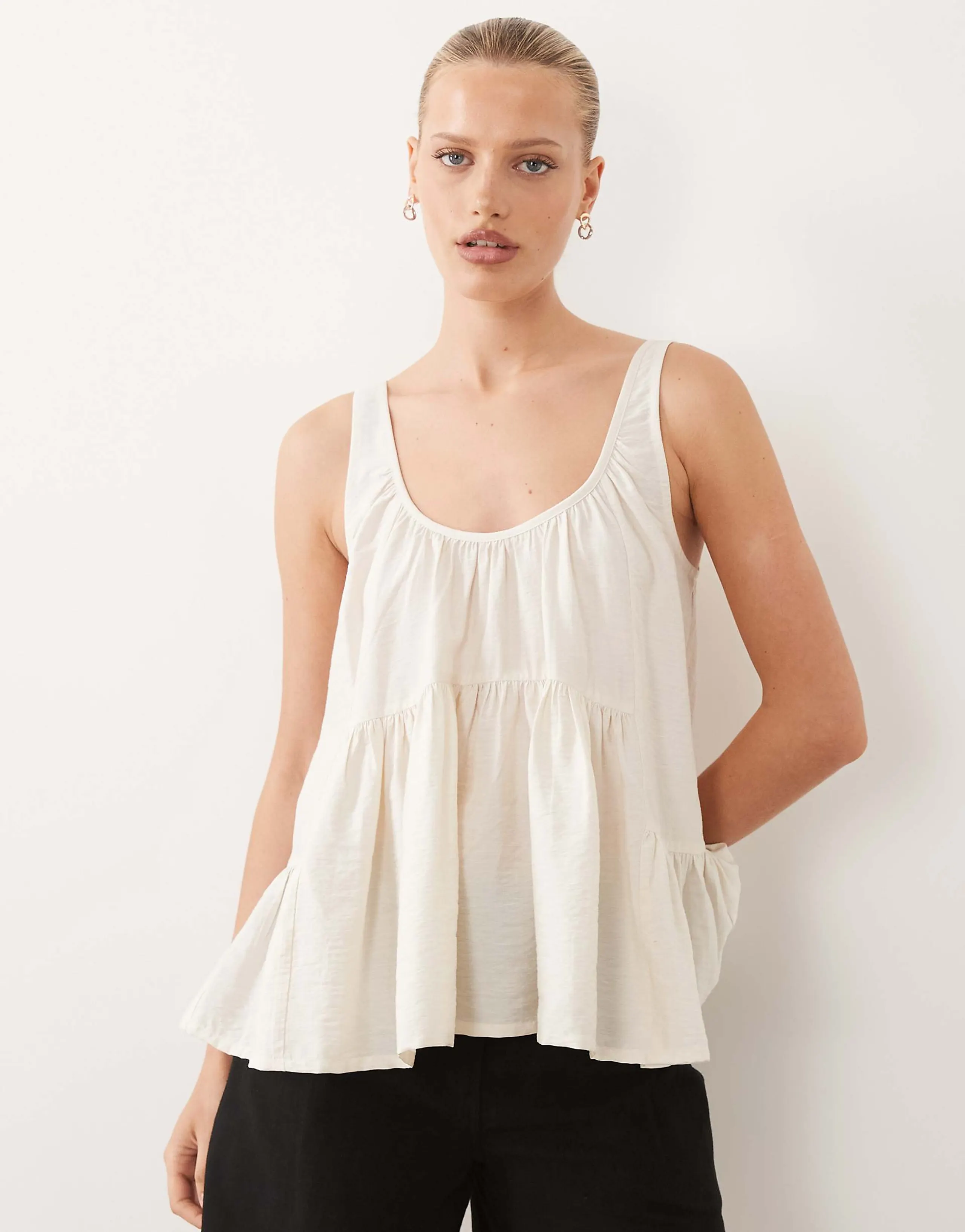 ASOS DESIGN scoop neck peplum cami top in champagne