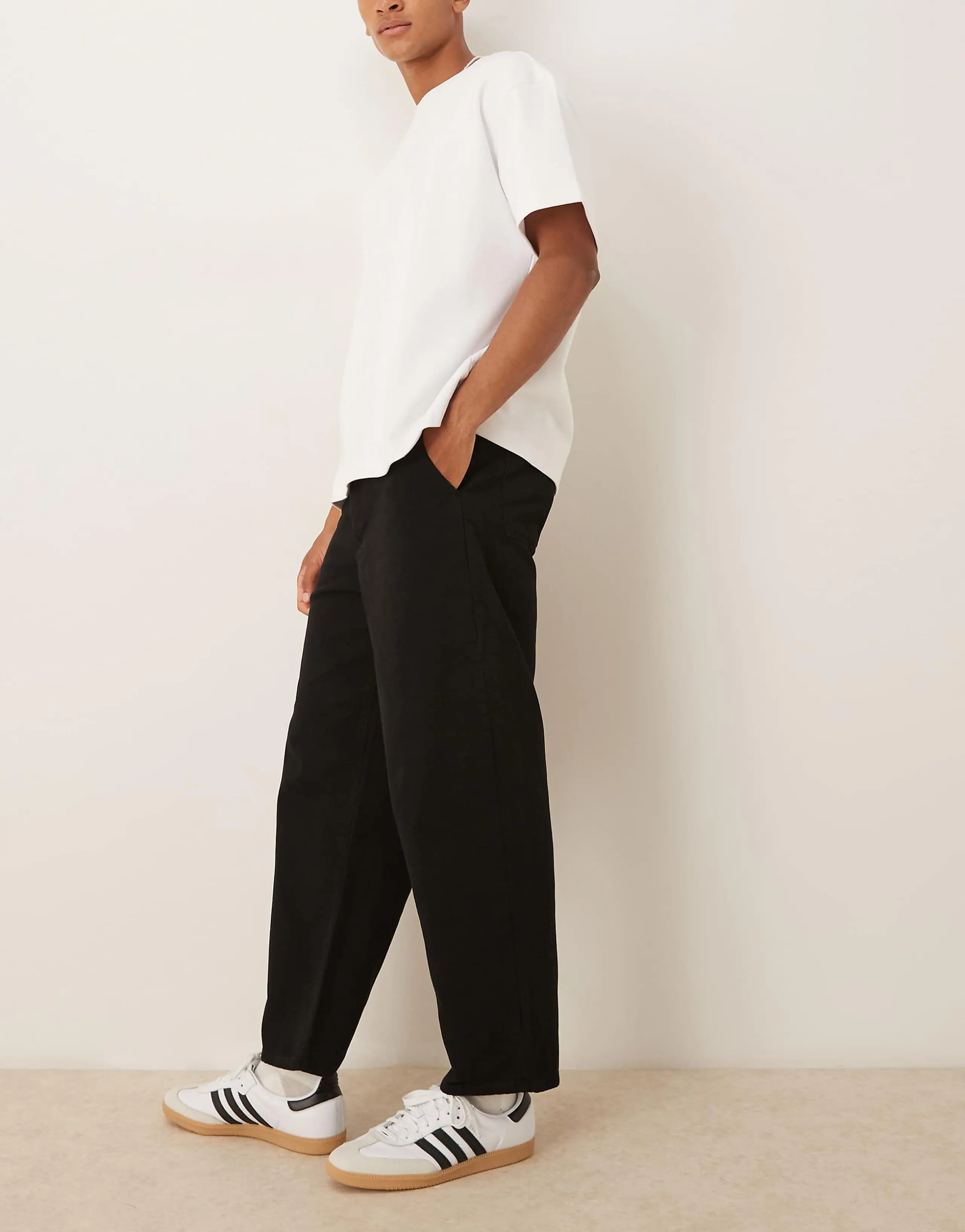 ASOS DESIGN relaxed tapered pants in black