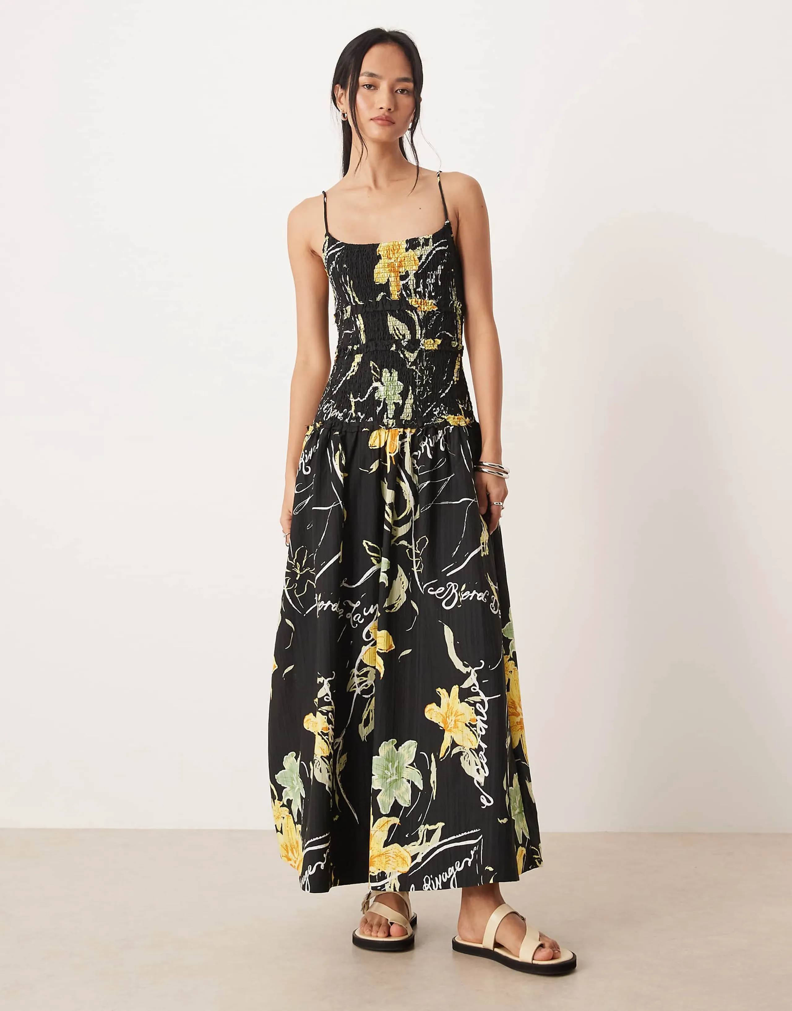 ASOS DESIGN crinkle maxi sundress with shirred dropped waist in oversized floral print
