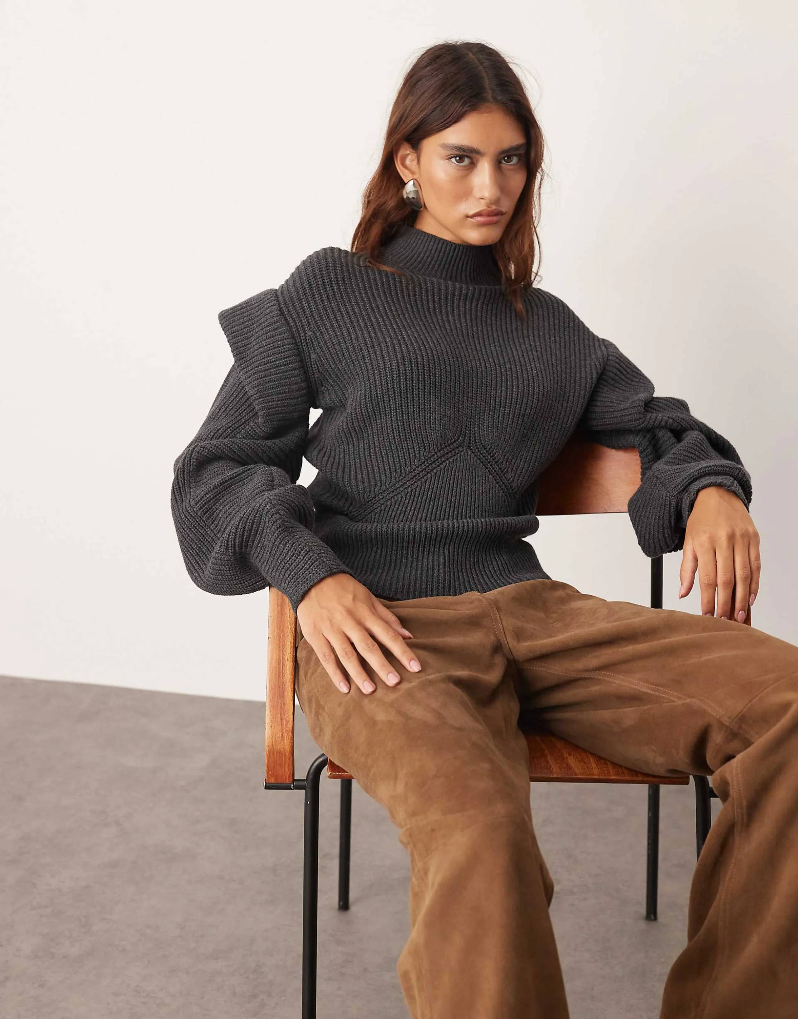 ARRANGE engineered knit sculpted sweater with shoulder detailing in charcoal