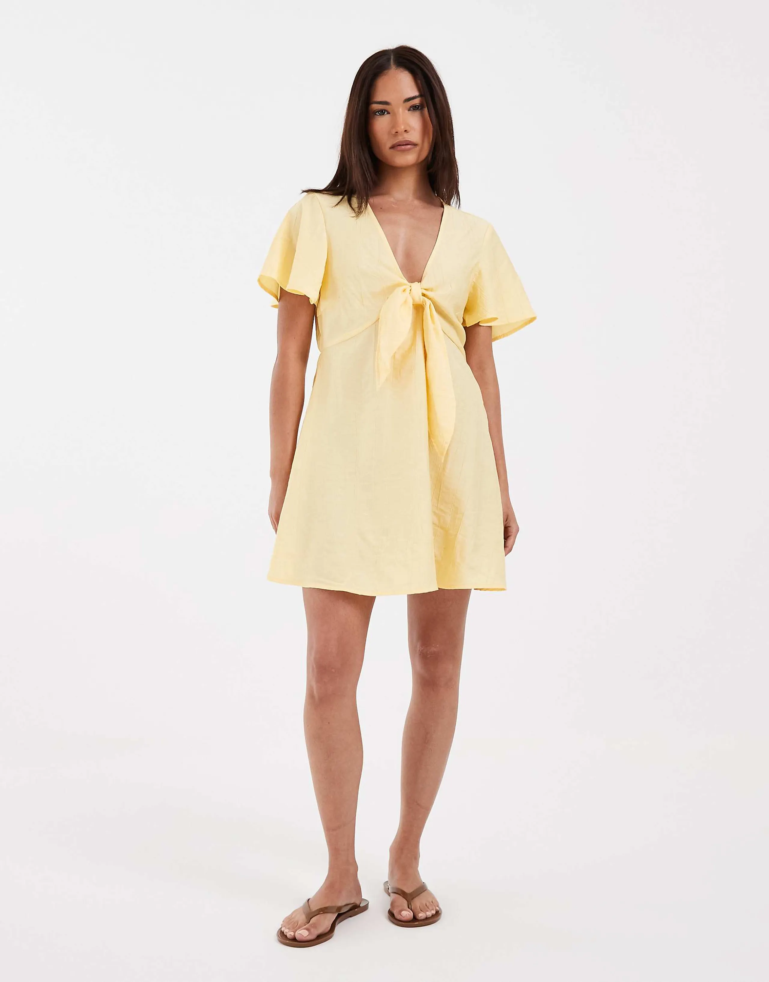 Vero Moda Petite crinkle textured woven tie front mini dress in golden yellow