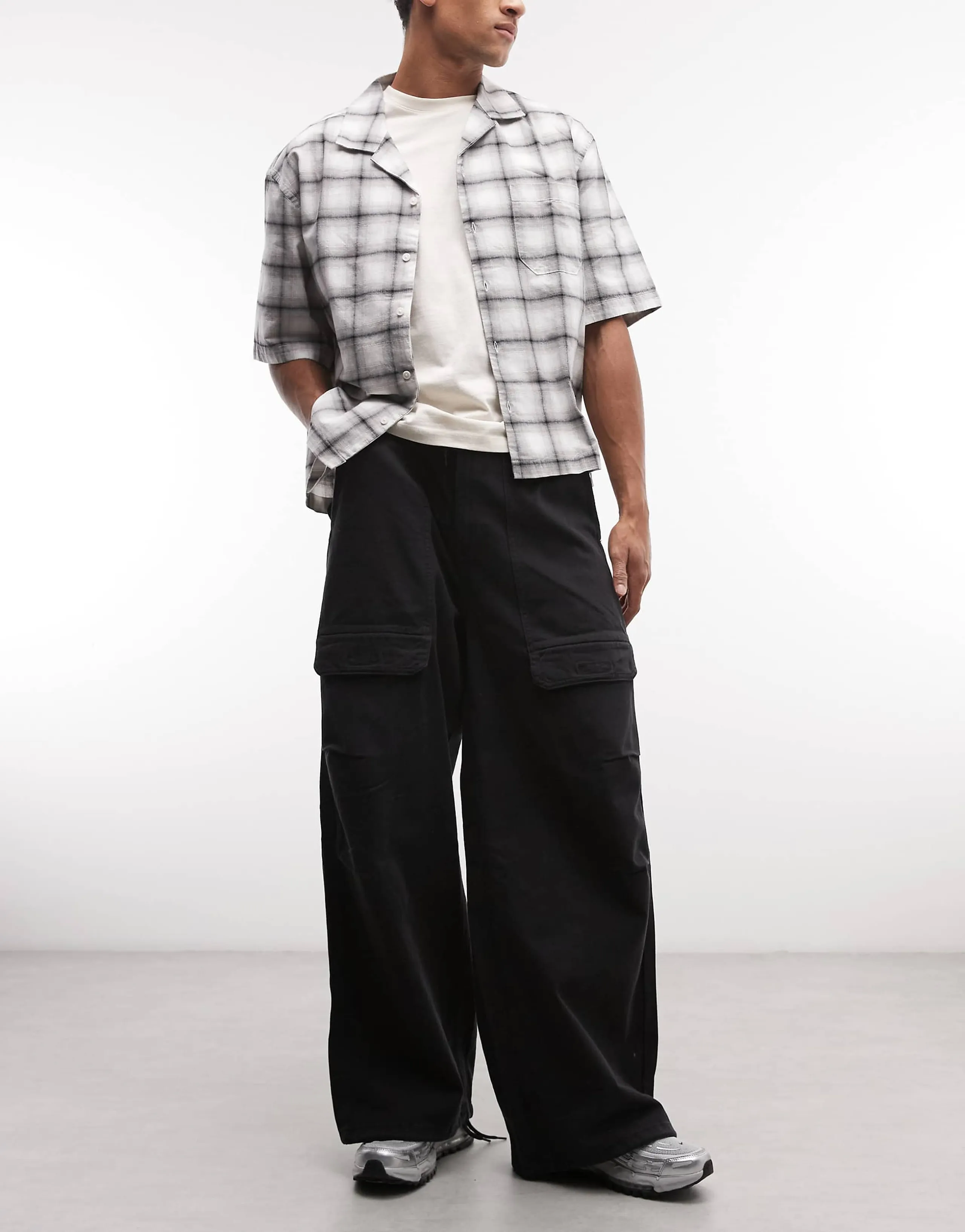 Weekday oversized parachute pants in washed black