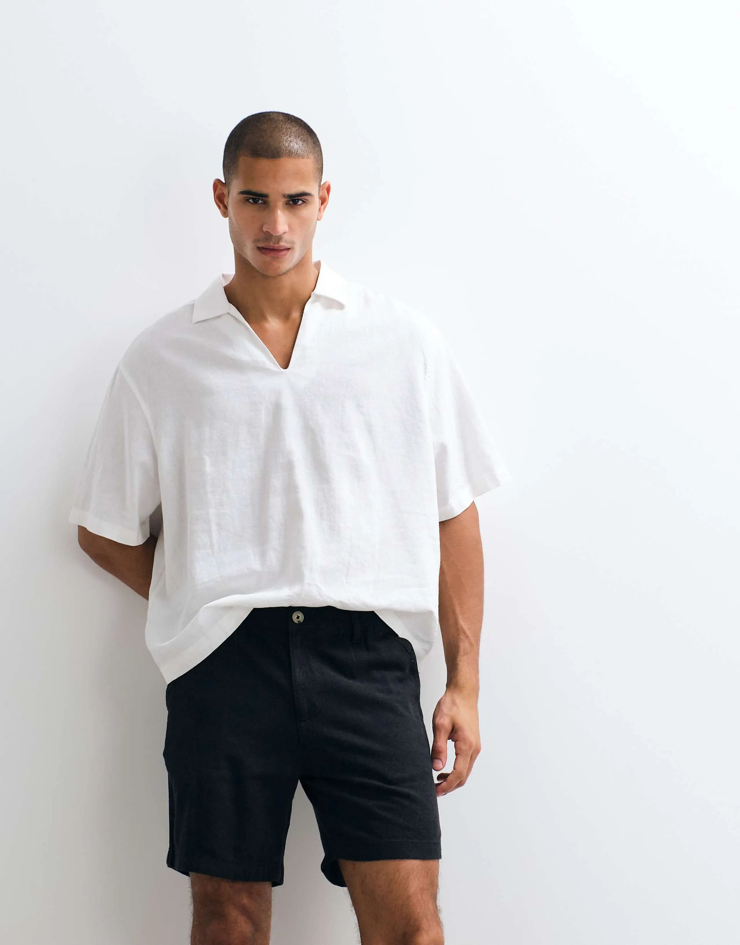 ASOS DESIGN mid length slim linen blend shorts in black