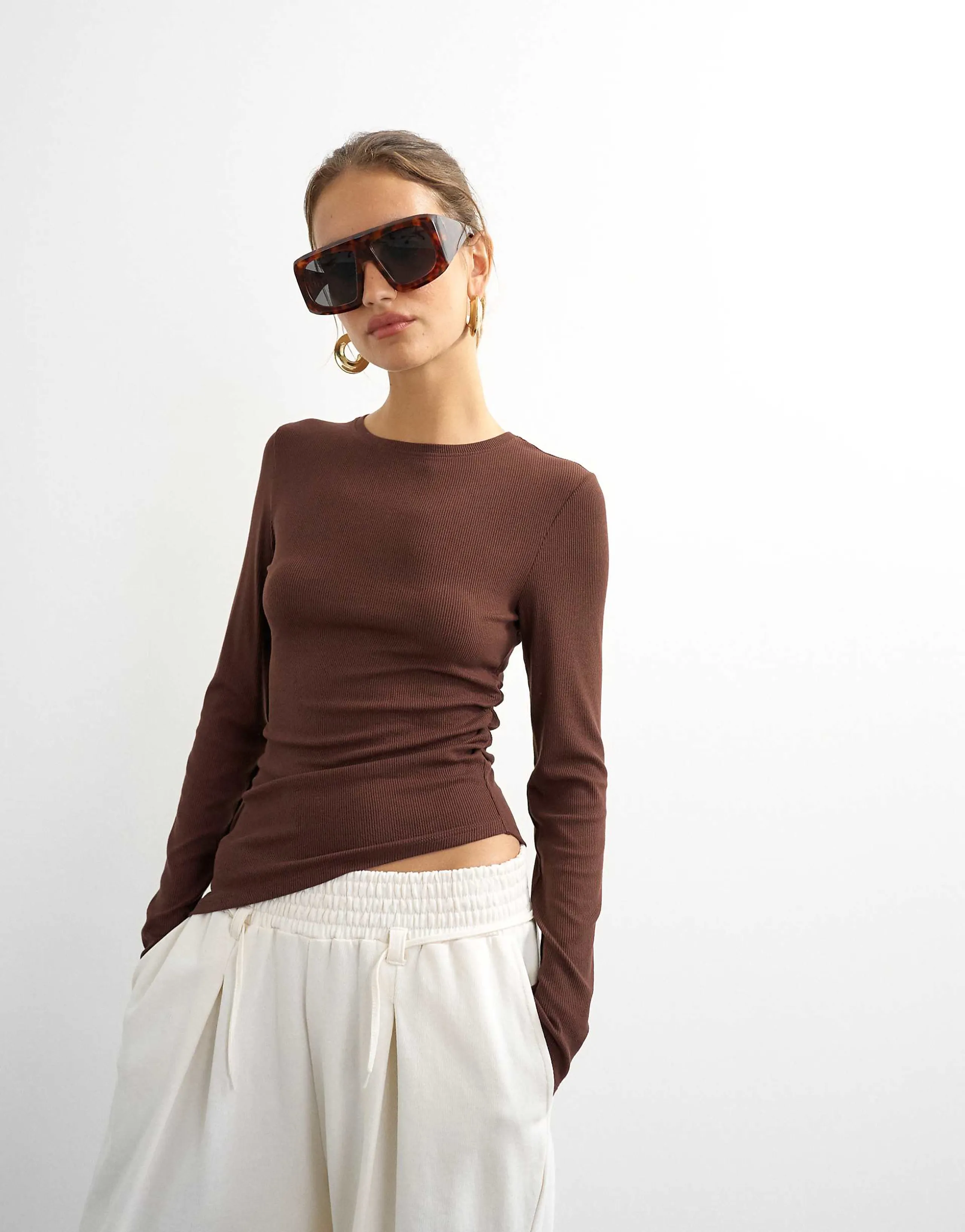 Topshop premium ribbed ruched asymmetric hem long sleeve top in chocolate