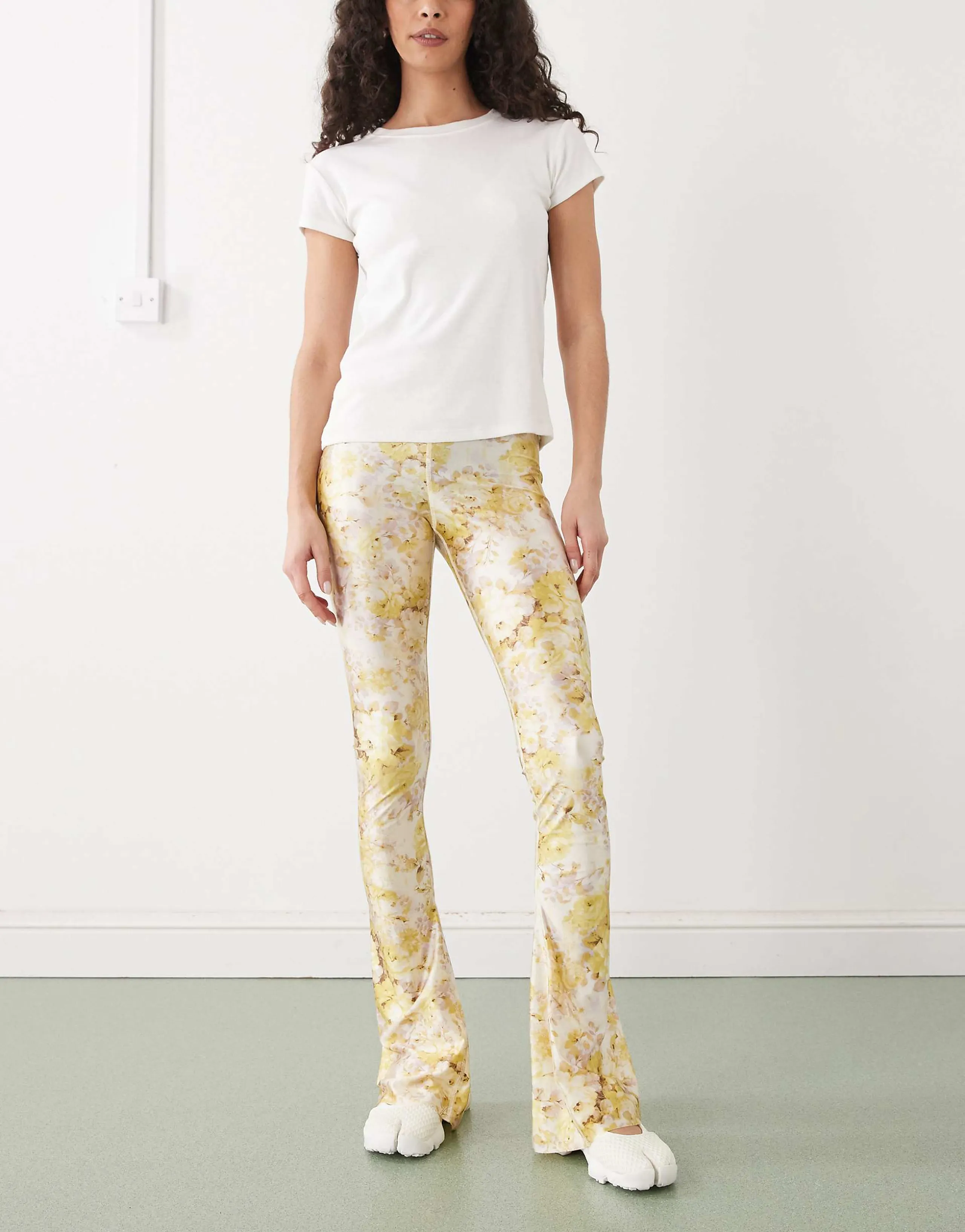 Monki slim flare pants in yellow floral