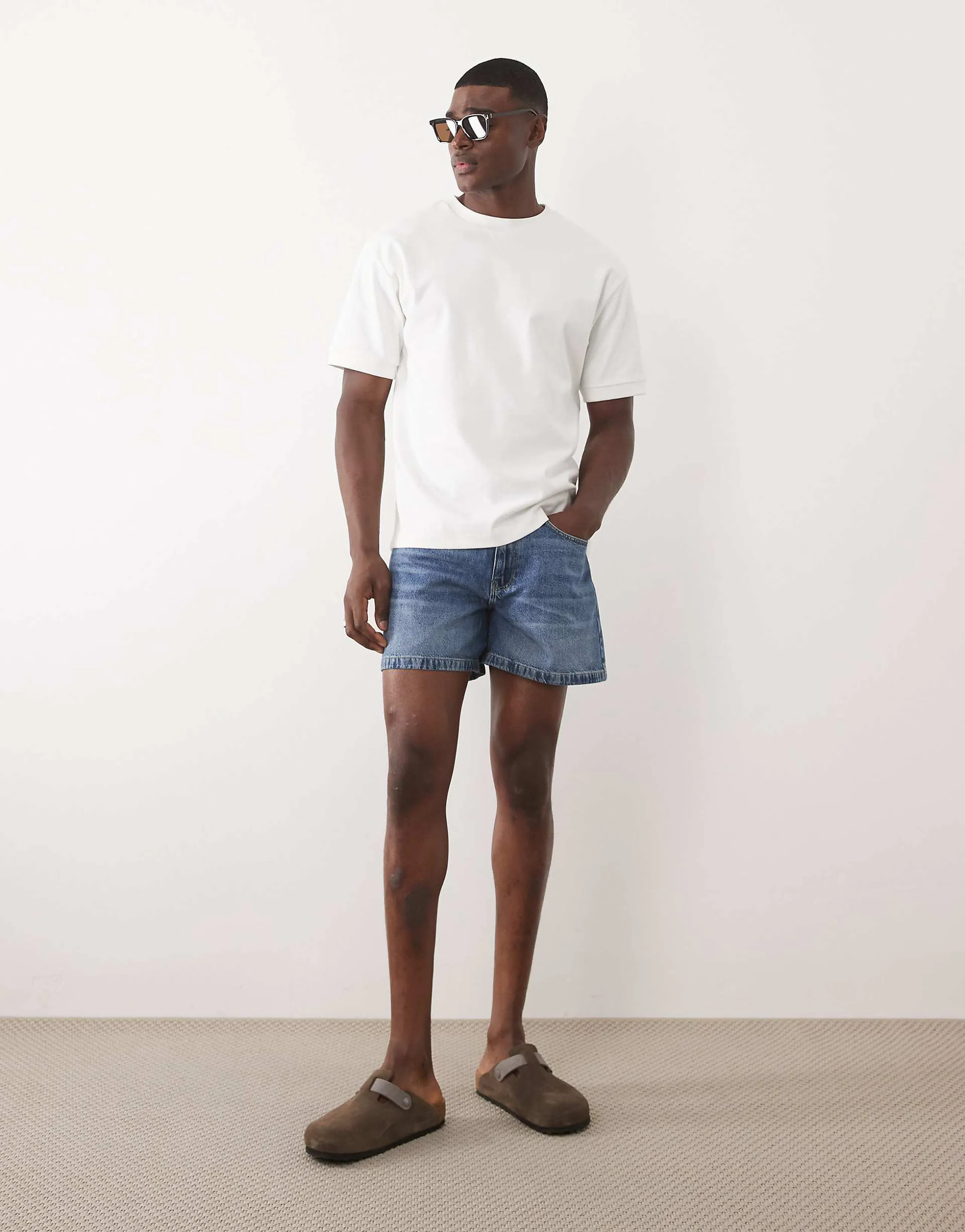 ASOS DESIGN shorter length denim jorts in mid wash blue