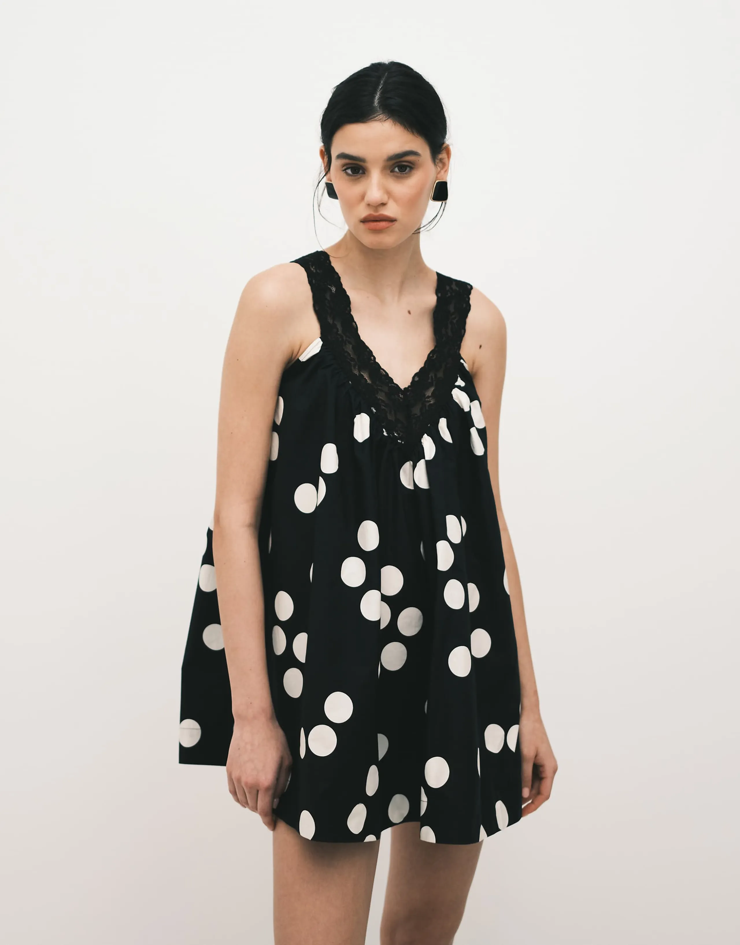 ASOS DESIGN v-neck smock poplin mini sundress with lace overlay in black and white polka dots 