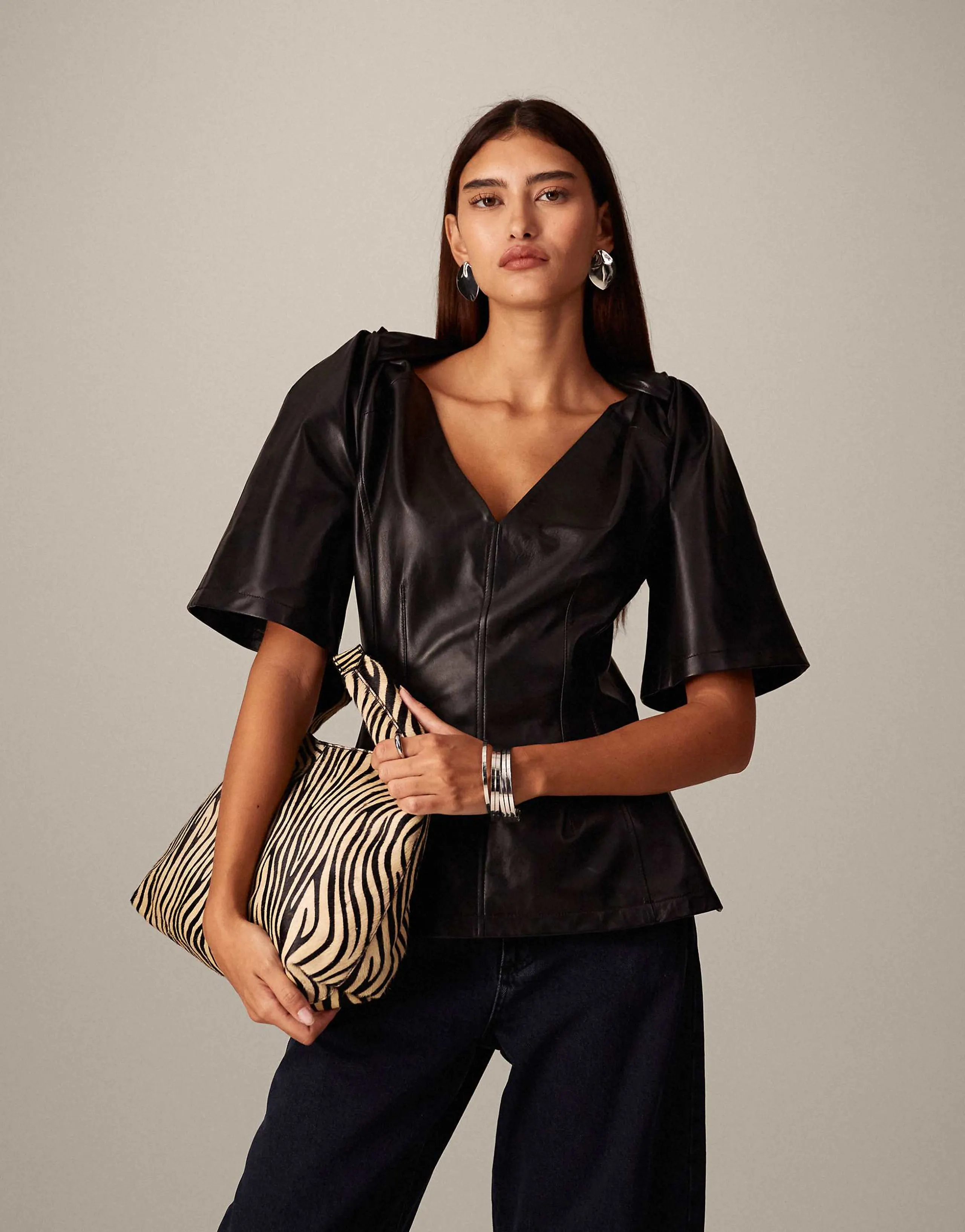 ARRANGE twist shoulder top in leather in black