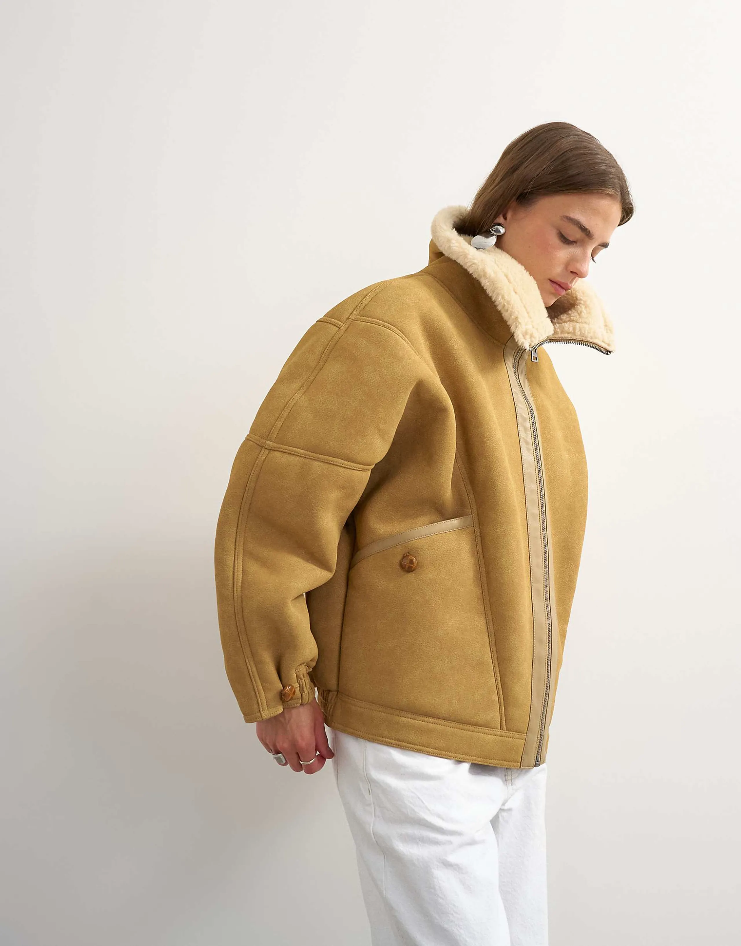 Topshop ovoid faux shearling jacket in tan