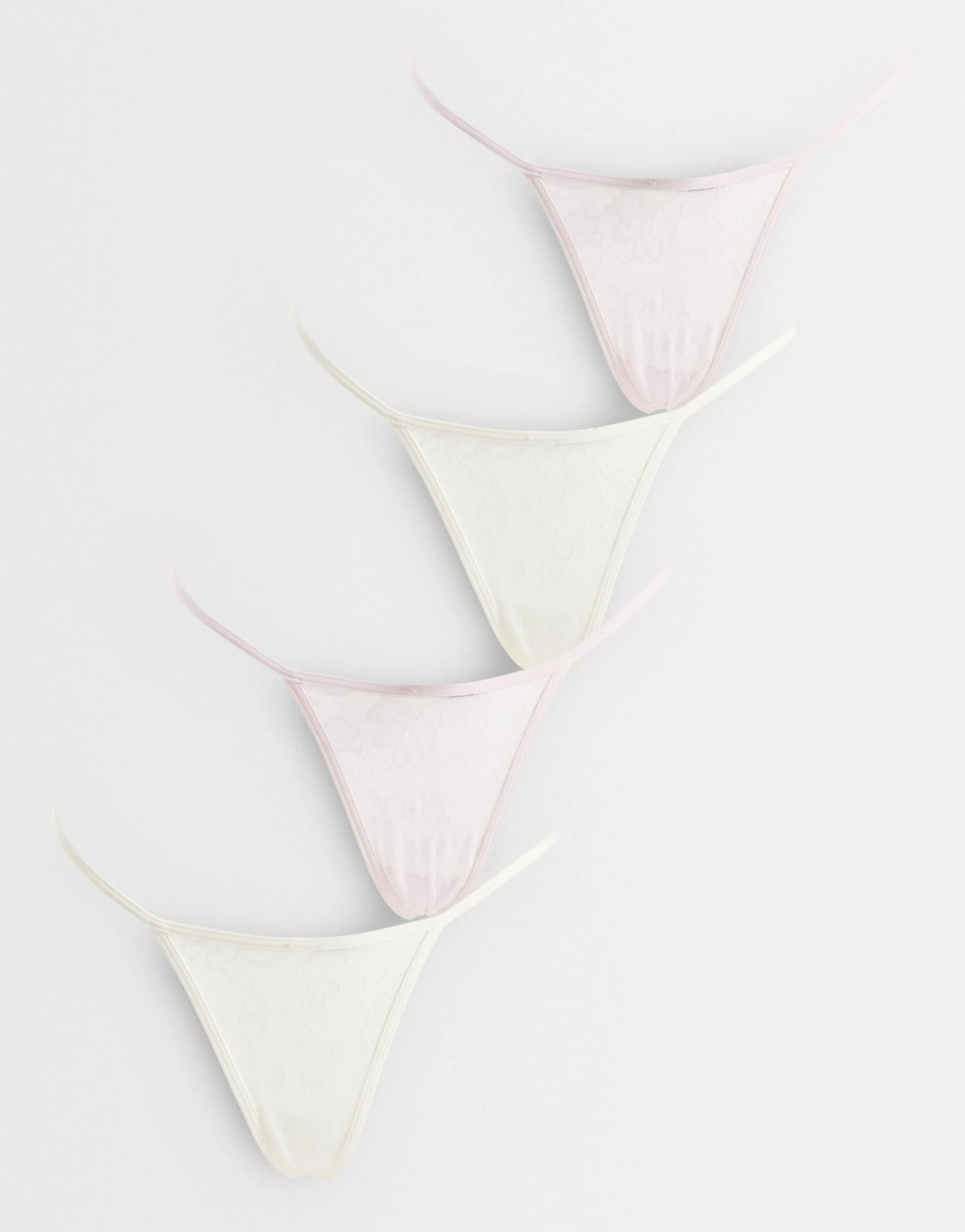 Cotton On 4 pack lace thong set in white and pink