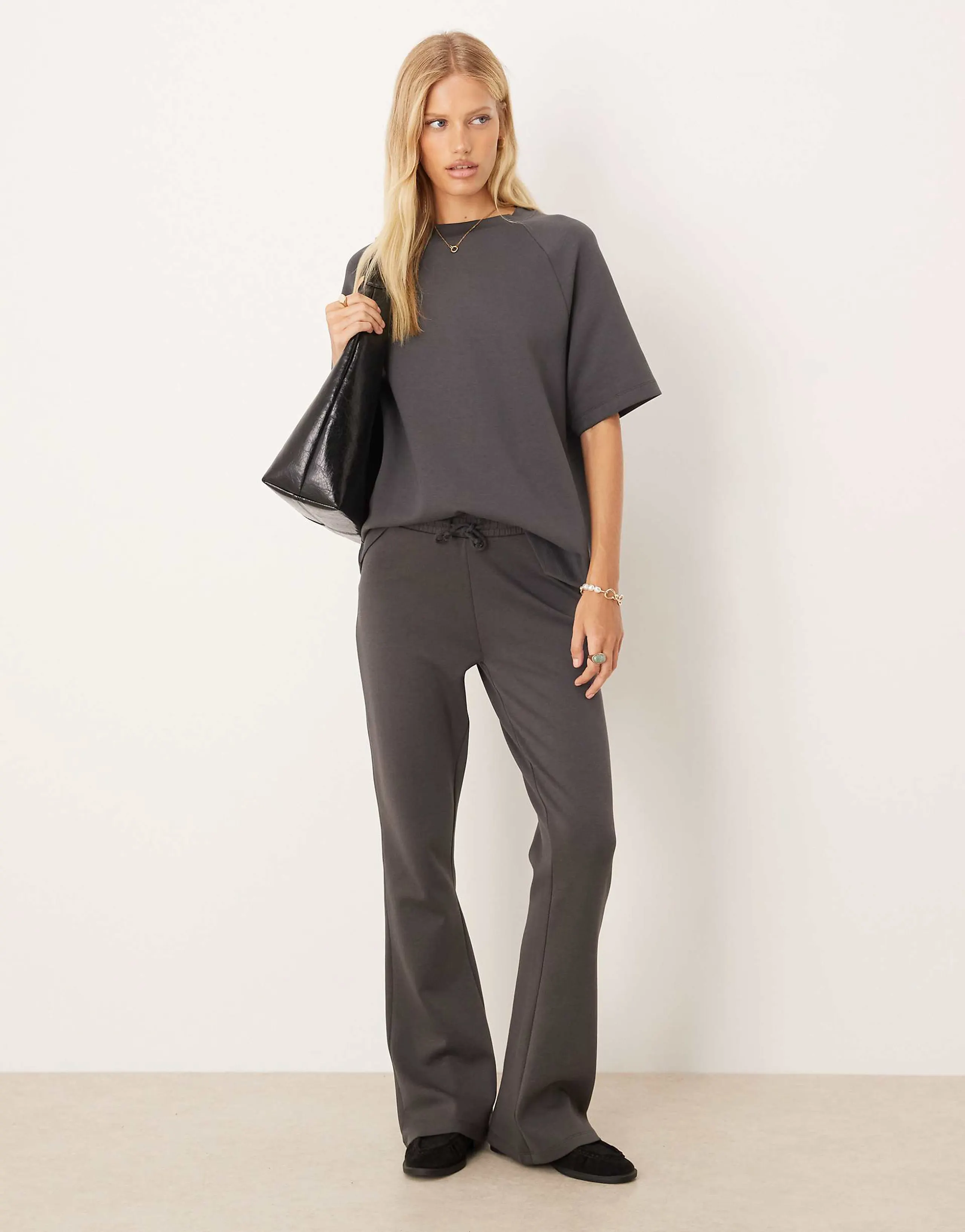 ASOS DESIGN interlock flared sweatpants in charcoal - part of a set