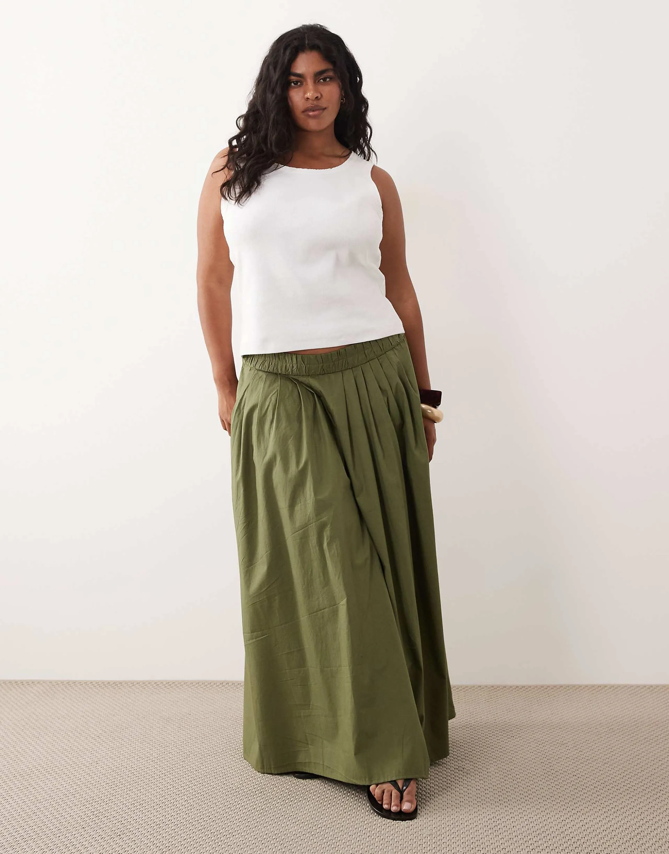 ASOS DESIGN Curve elastic waist volume maxi skirt in khaki