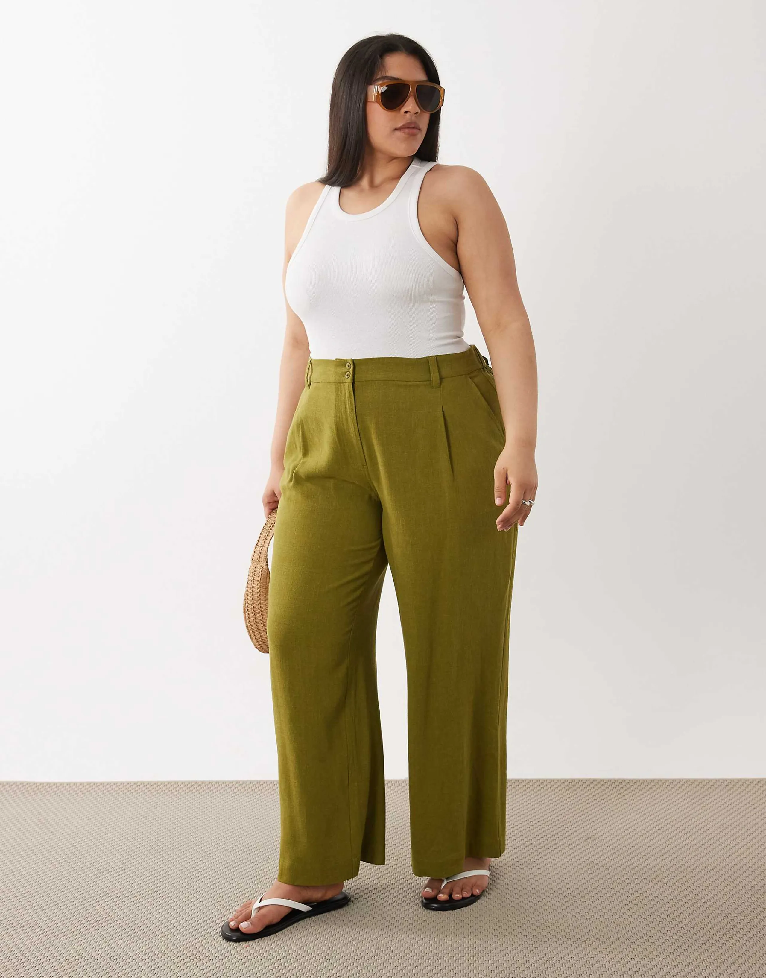 ASOS DESIGN Curve relaxed straight leg pants with linen in green
