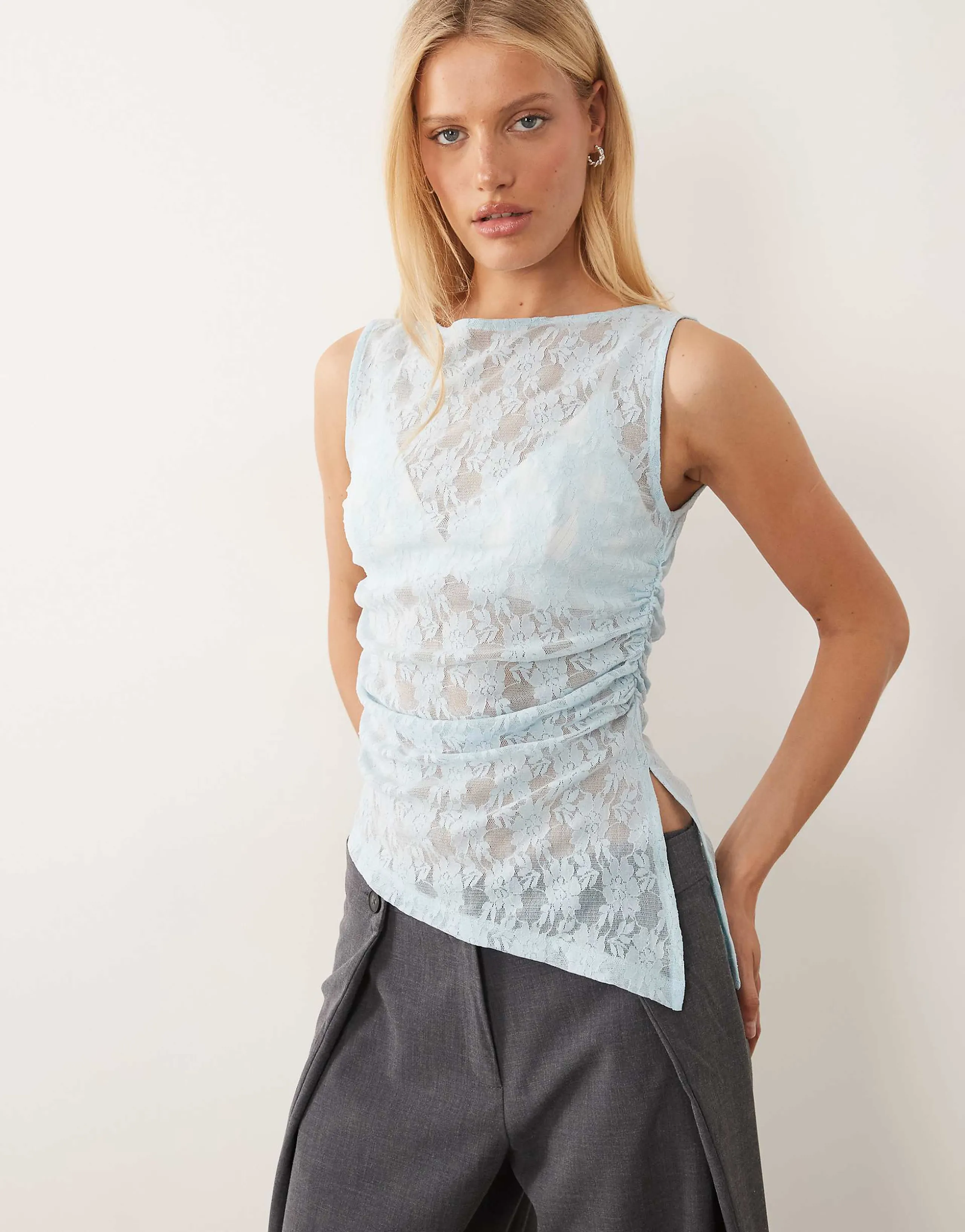 ASOS DESIGN sleeveless gathered side lace asymmetric detail top in baby blue