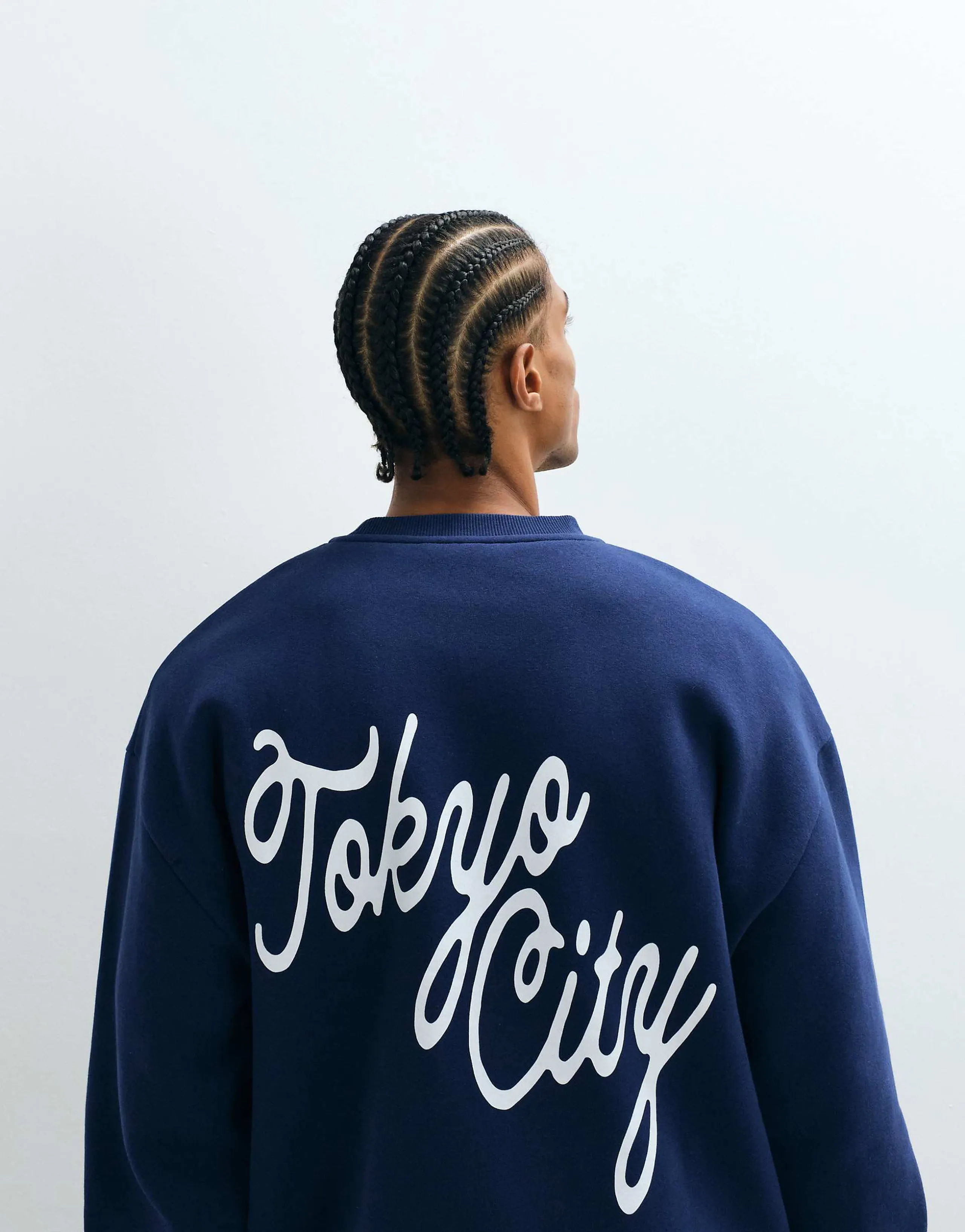 ASOS DESIGN oversized sweatshirt with tokyo print in navy