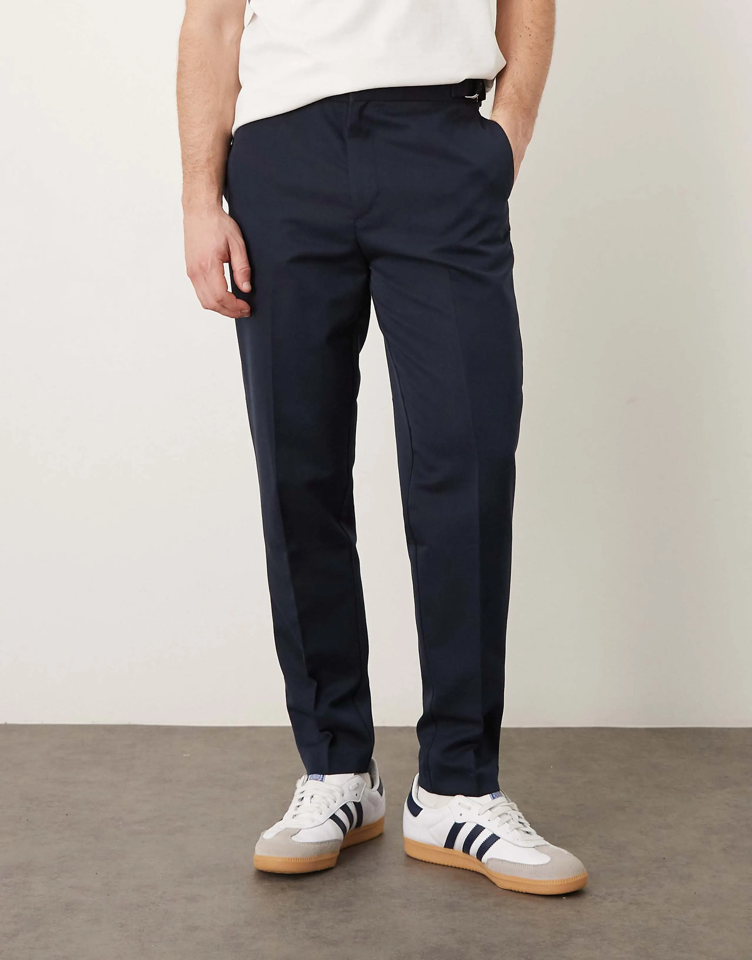 ASOS DESIGN tapered dress pants with side adjusters in navy