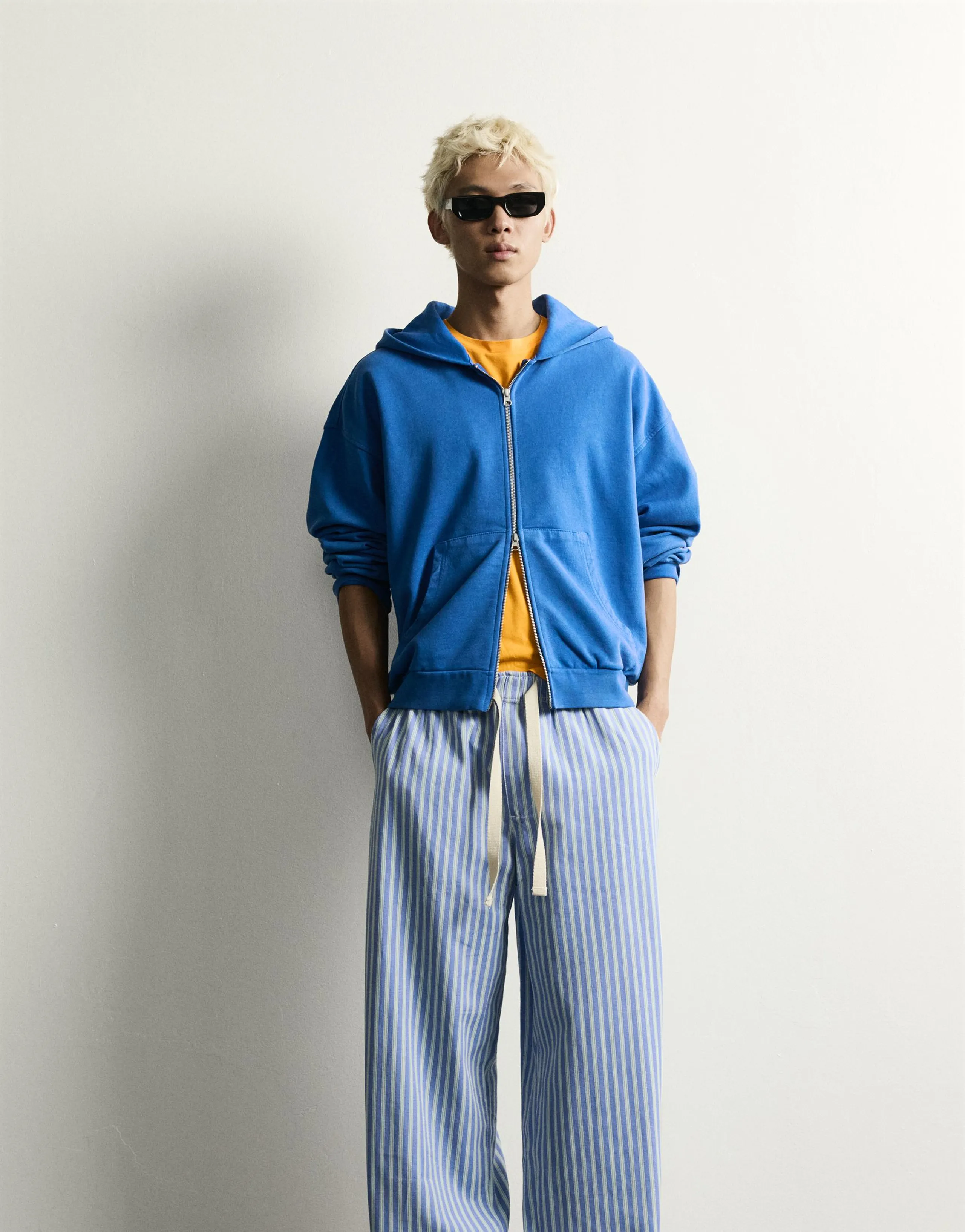 STRIPED BAGGY FIT TROUSERS