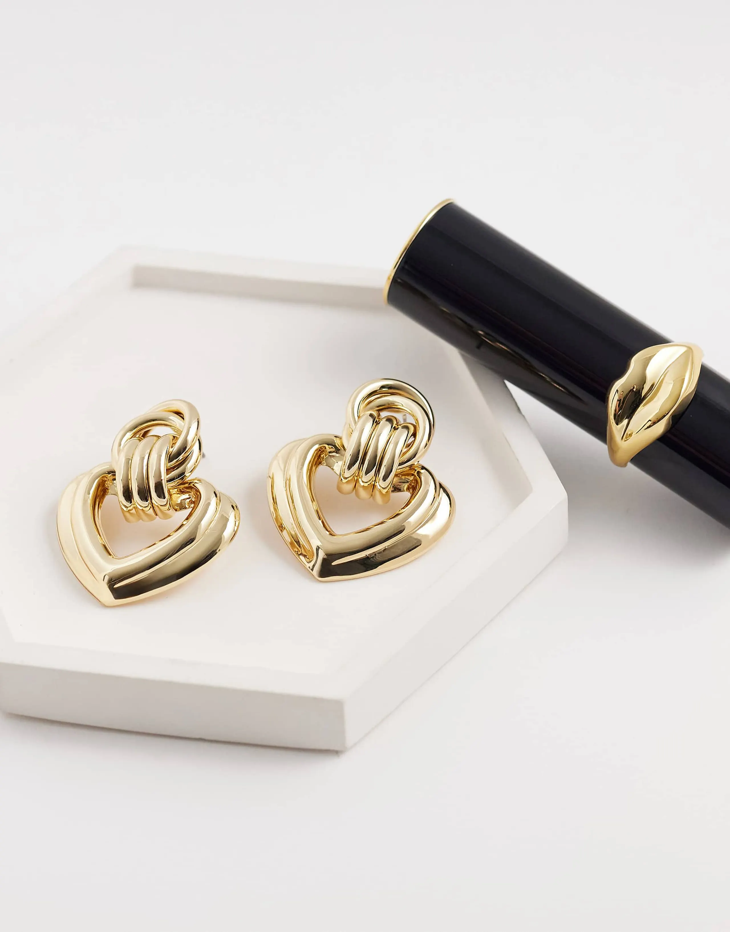 ASOS DESIGN heart detailed earrings in gold tone