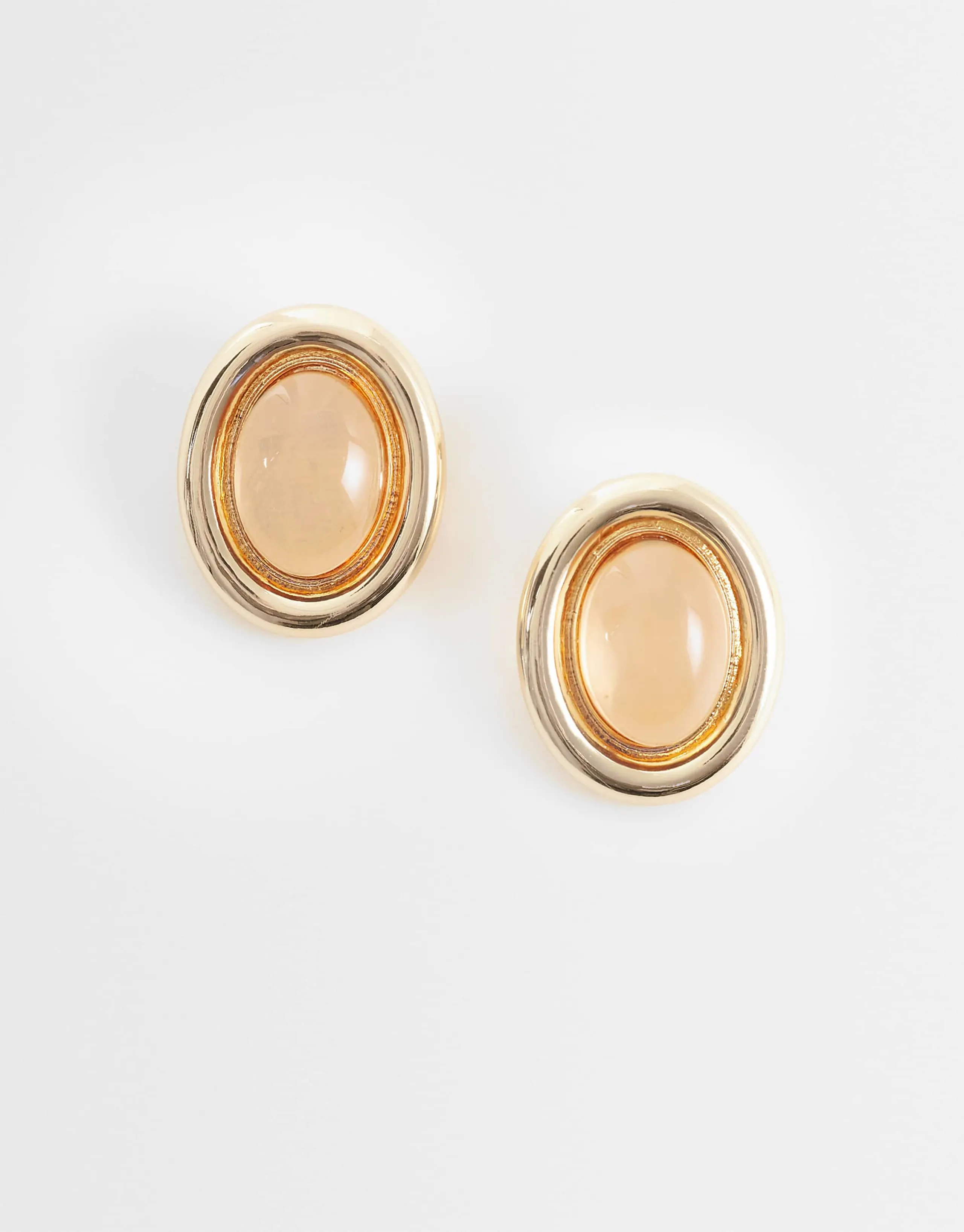 ASOS DESIGN stud earrings with stone set design in amber