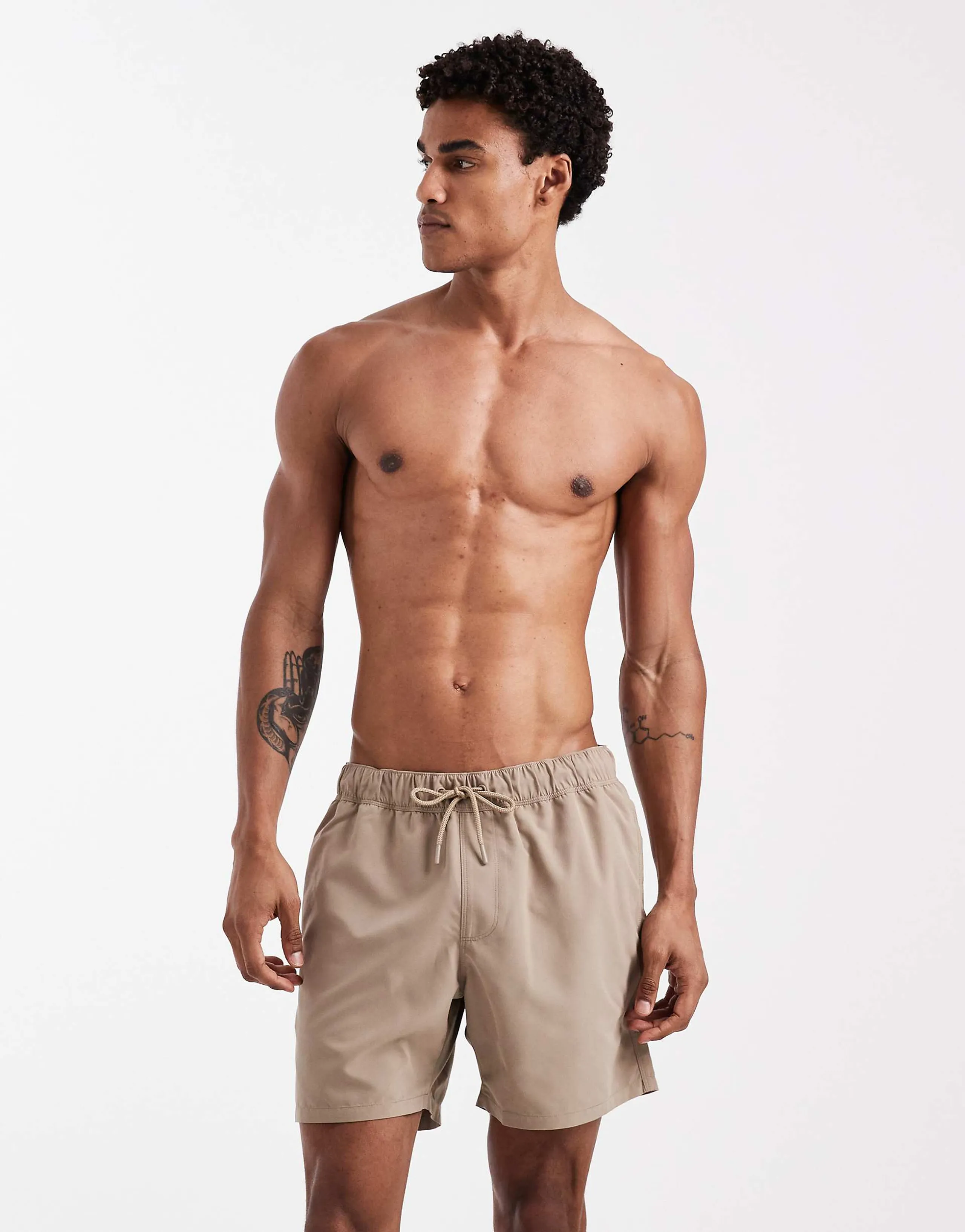 ASOS DESIGN swim shorts in mid length in beige