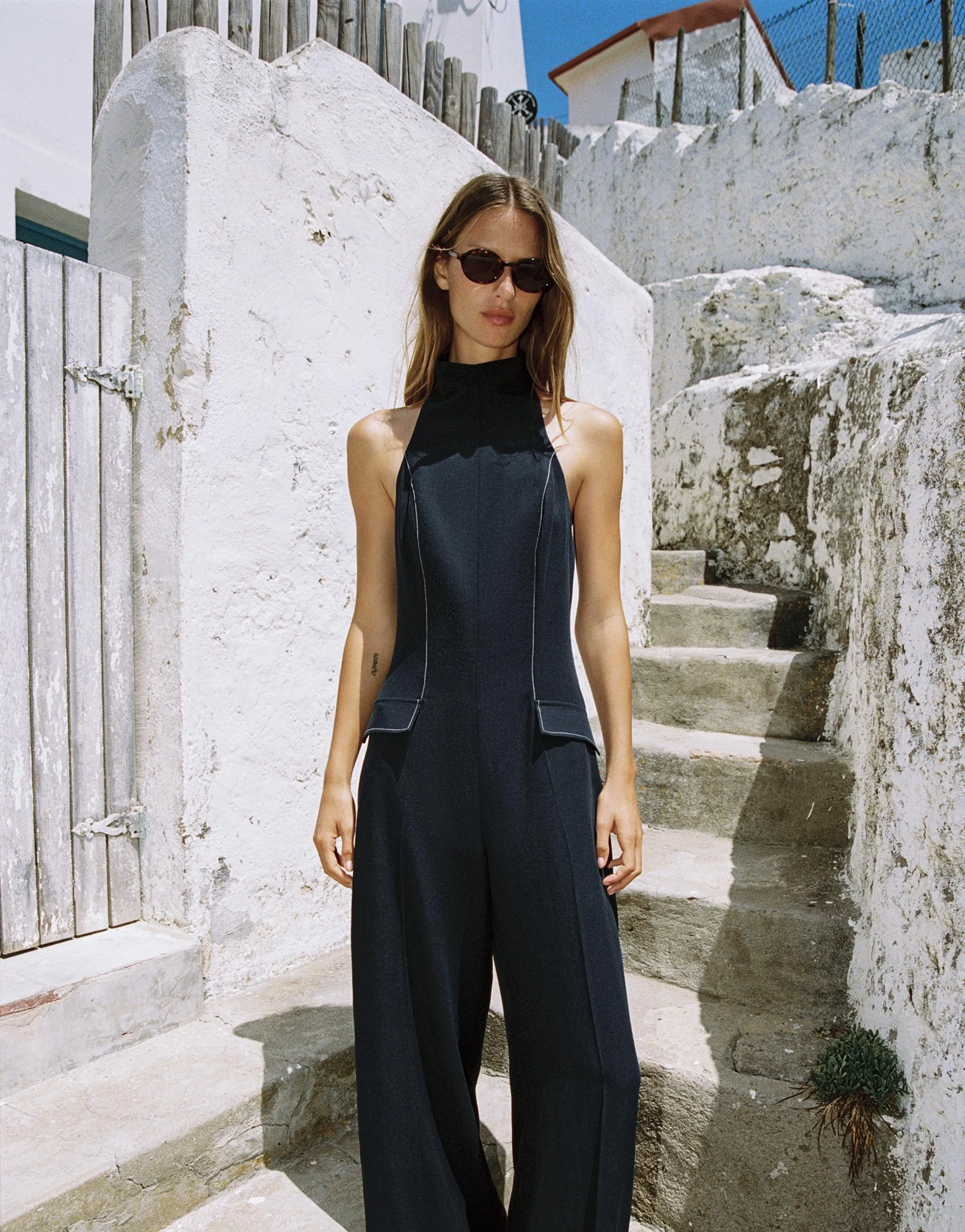 HALTER JUMPSUIT WITH CONTRAST TRIMS