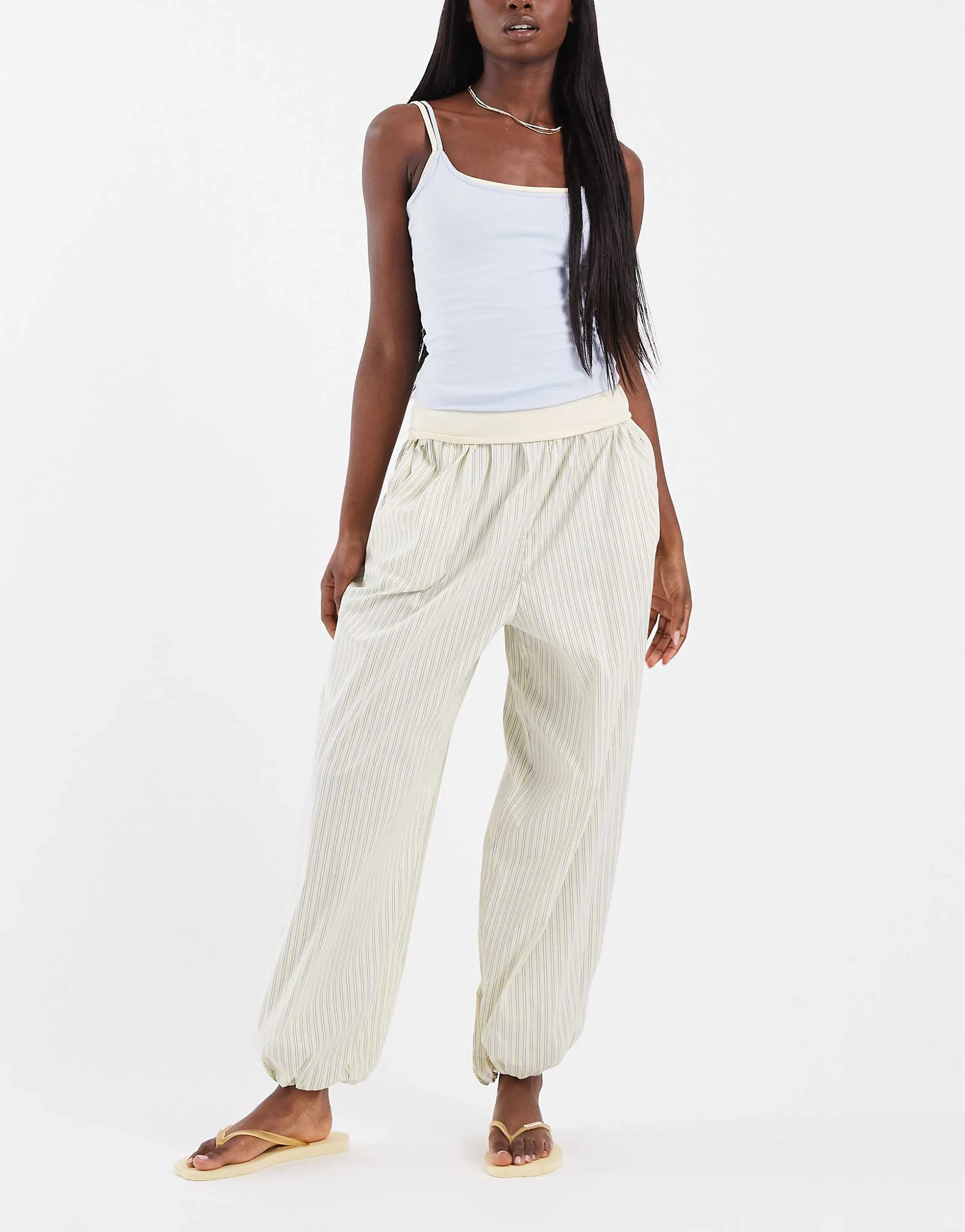 ASOS DESIGN balloon pants in yellow striped print