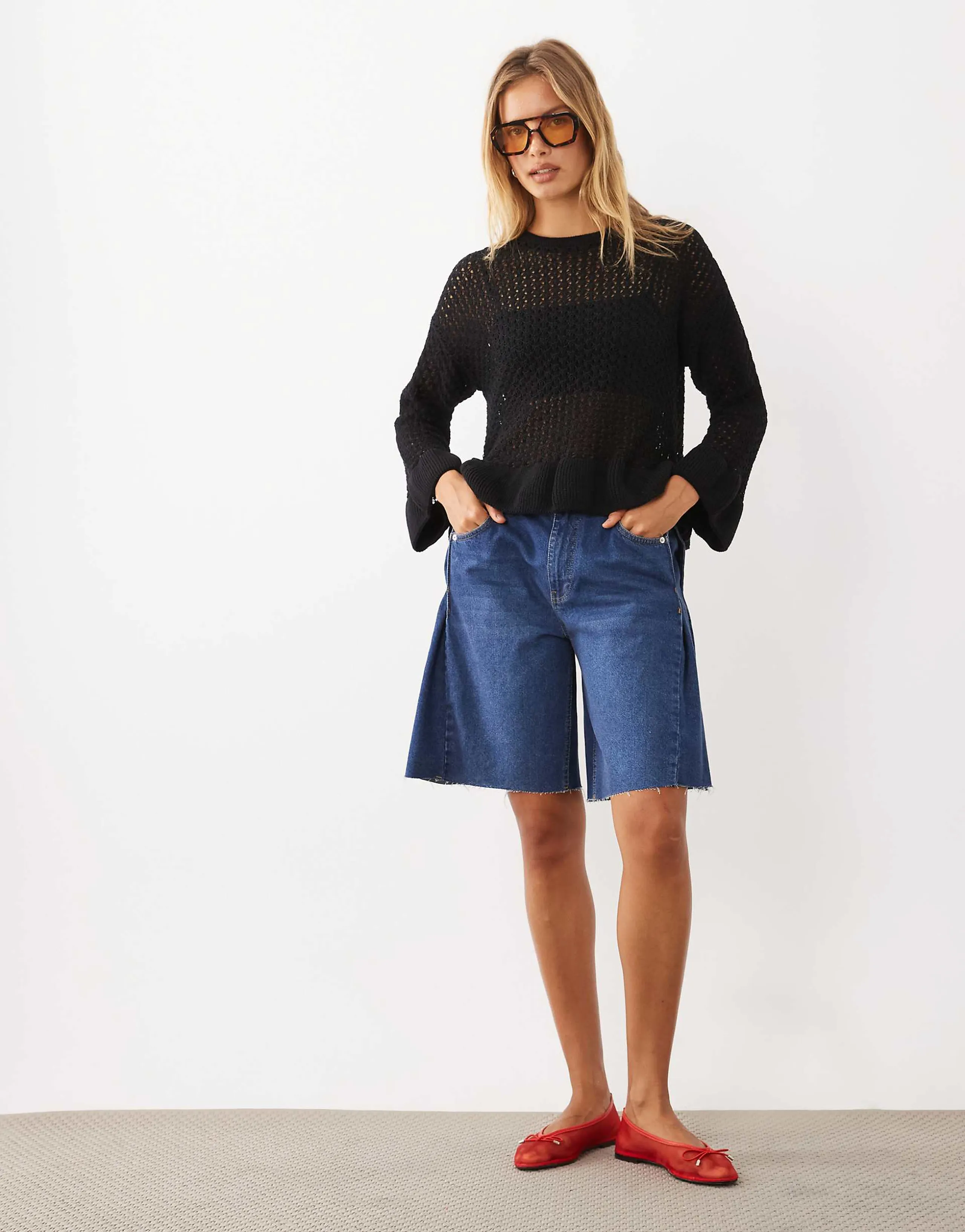 Miss Selfridge crochet sweater with peplum hem and sleeve in black