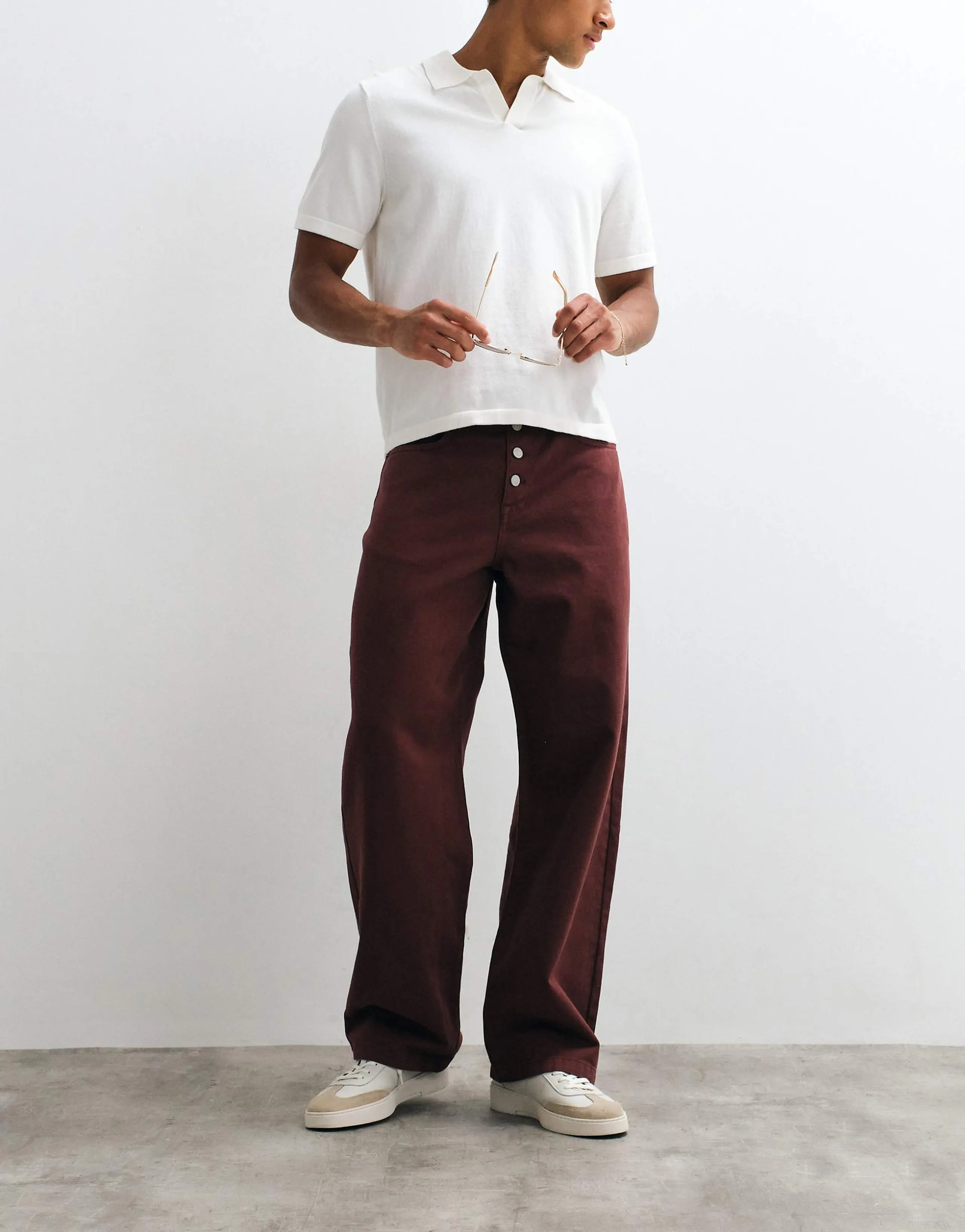 ASOS DESIGN baggy pants with exposed buttons in brown