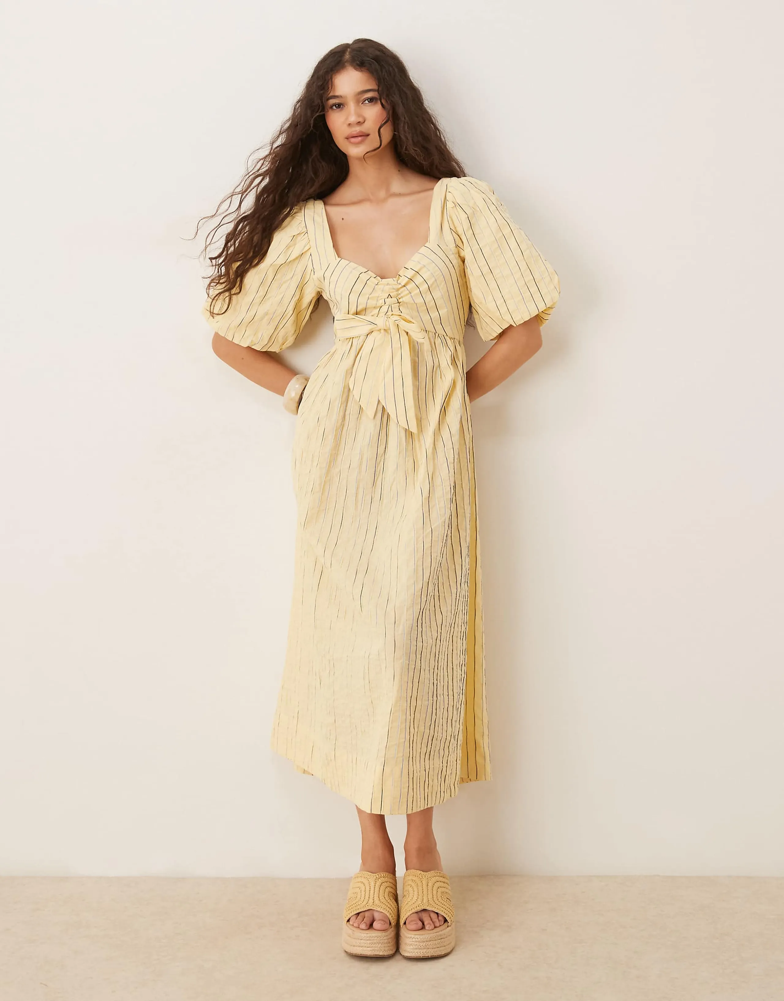 YAS puff sleeve bow front textured midi dress in yellow