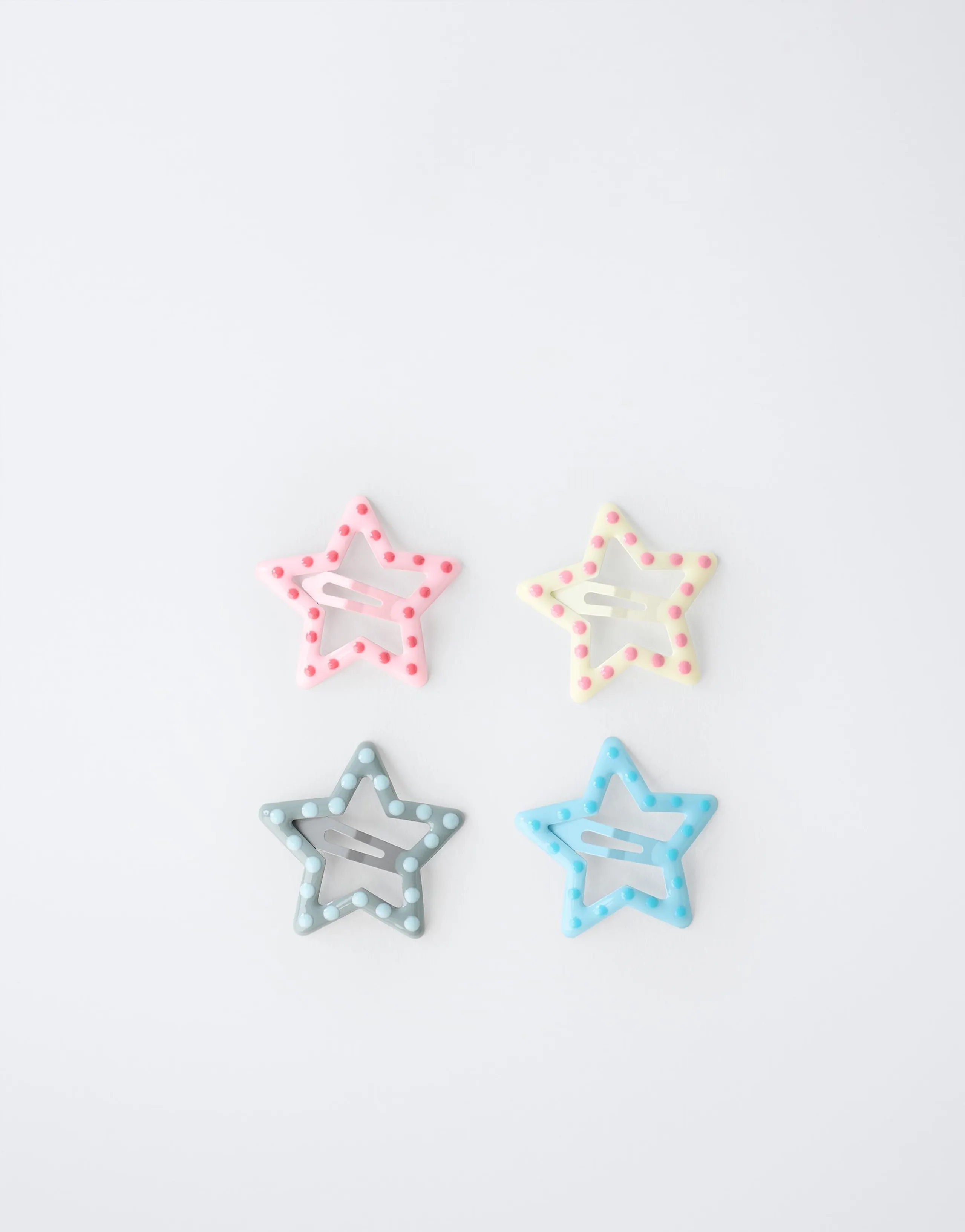 4-PACK OF POLKA DOT STAR HAIR CLIPS