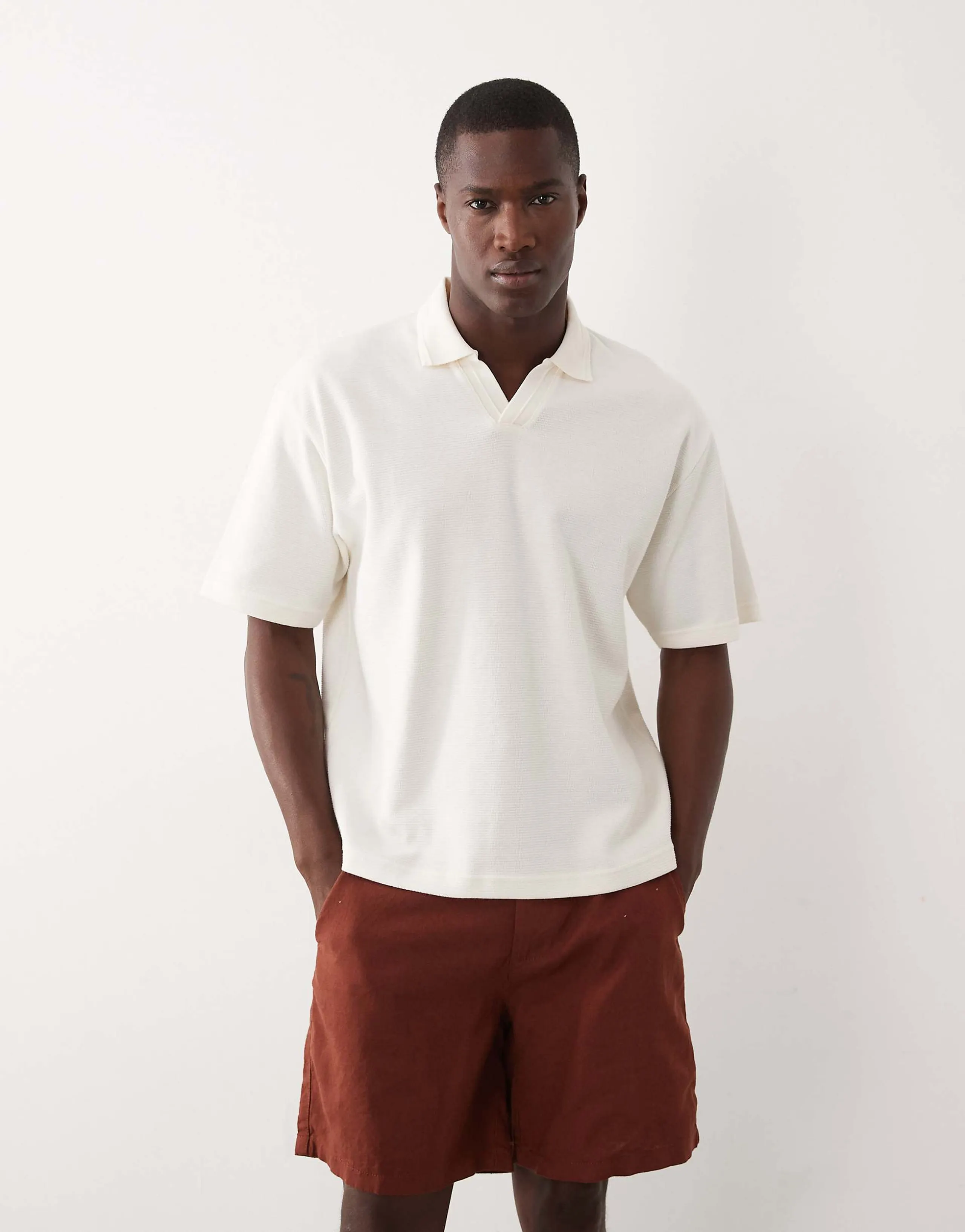 ASOS DESIGN relaxed boxy oversized notch polo with hem band in cream texture