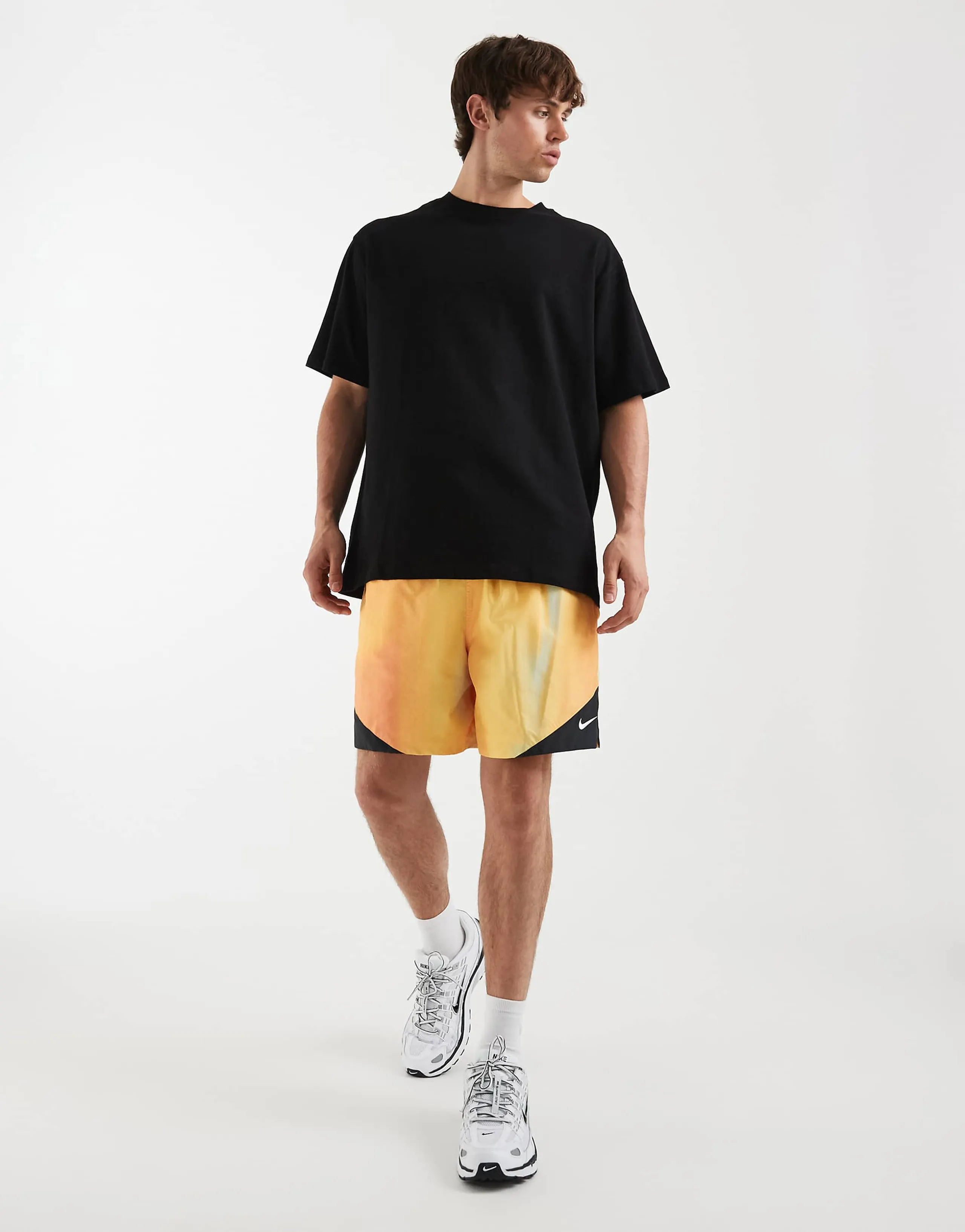 Nike Windrunner shorts in orange