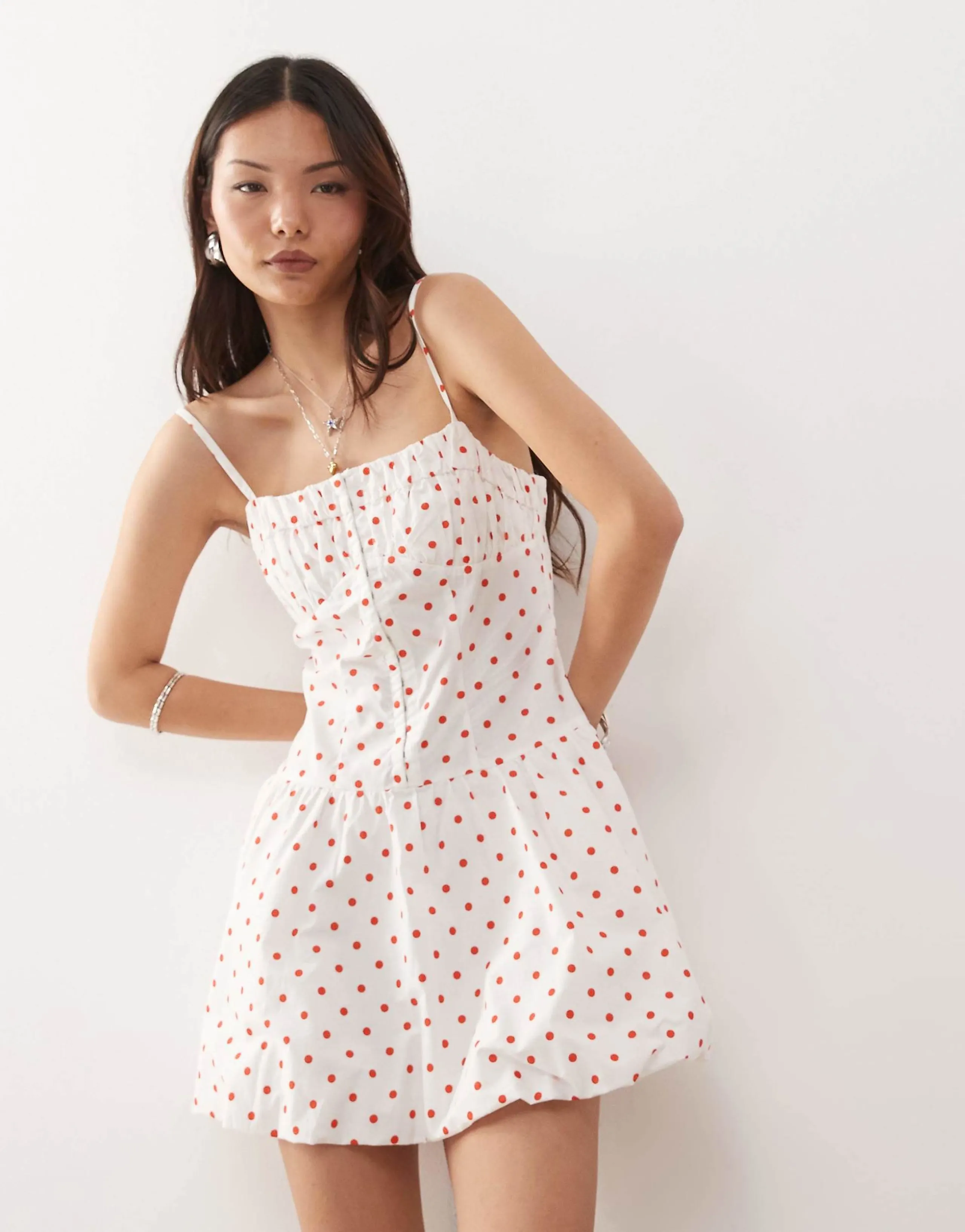 Reclaimed Vintage puffball mini dress with hook and eye in red polka dot print
