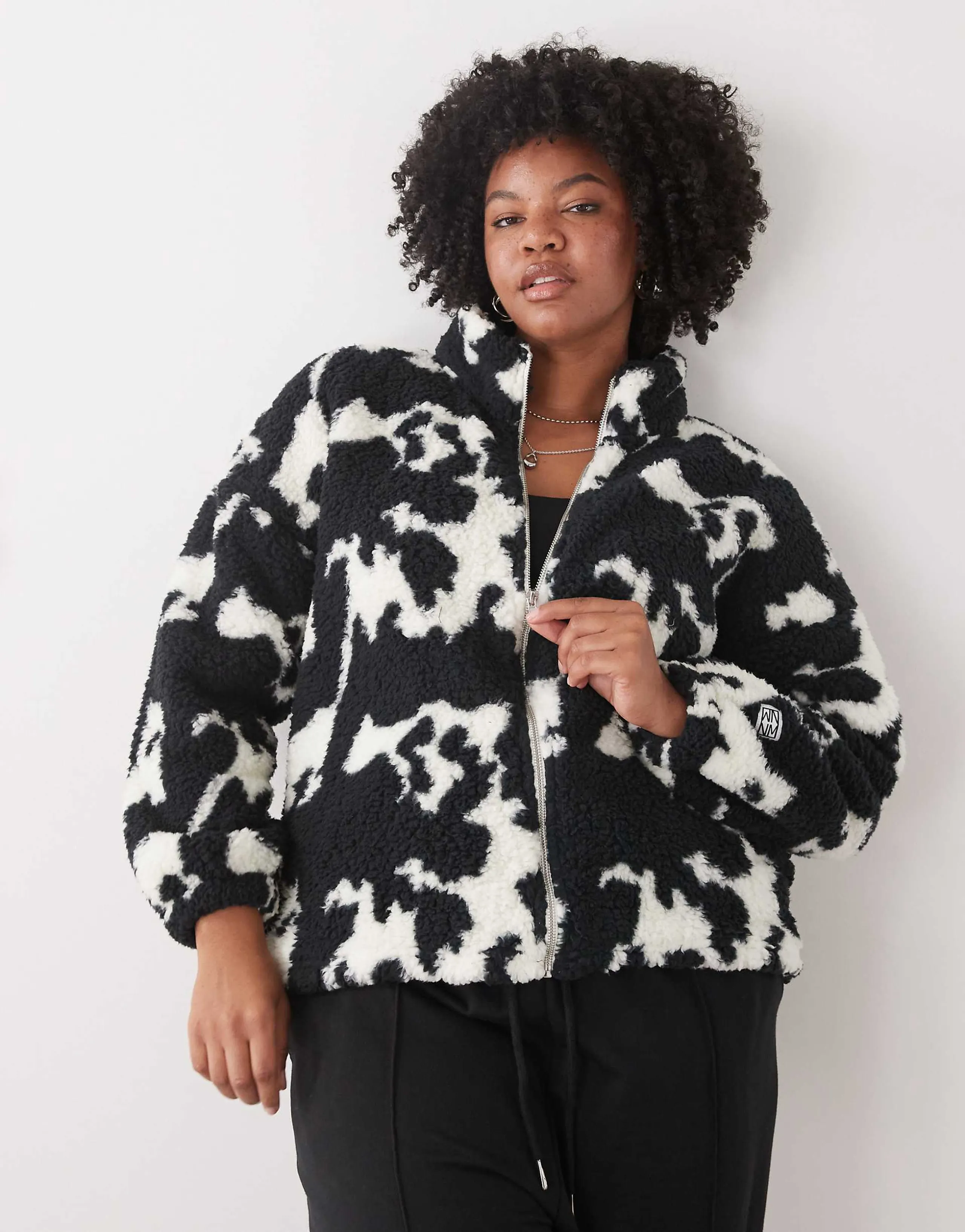 Noisy May Curve zip up fleece in mono cow
