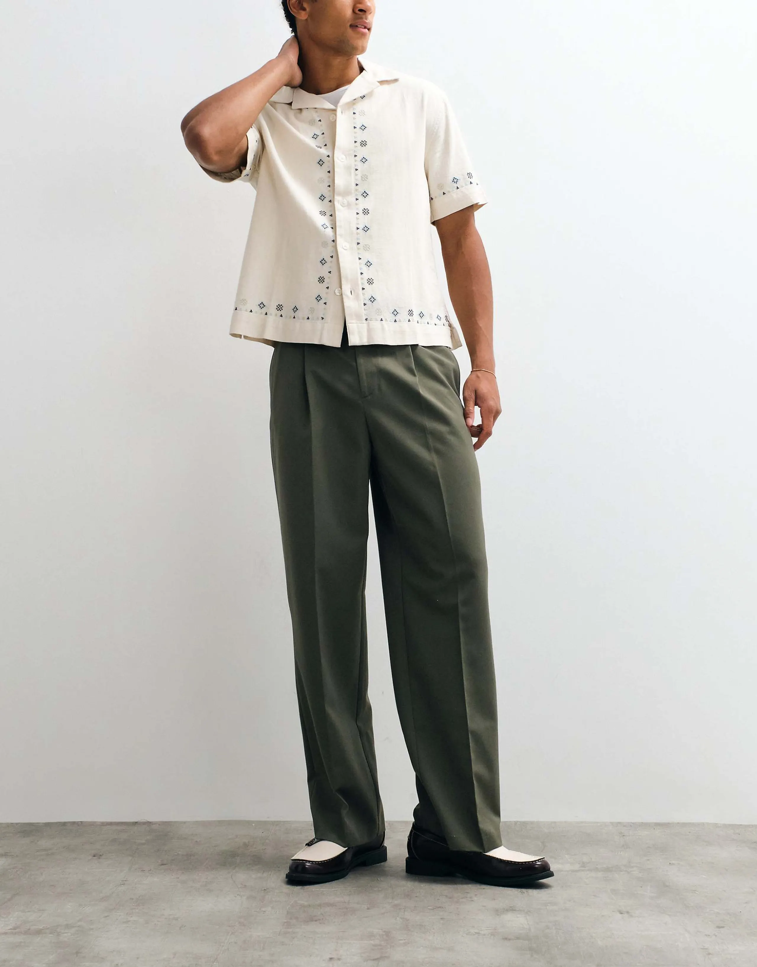 ASOS DESIGN tailored pleated wide leg pants in olive green