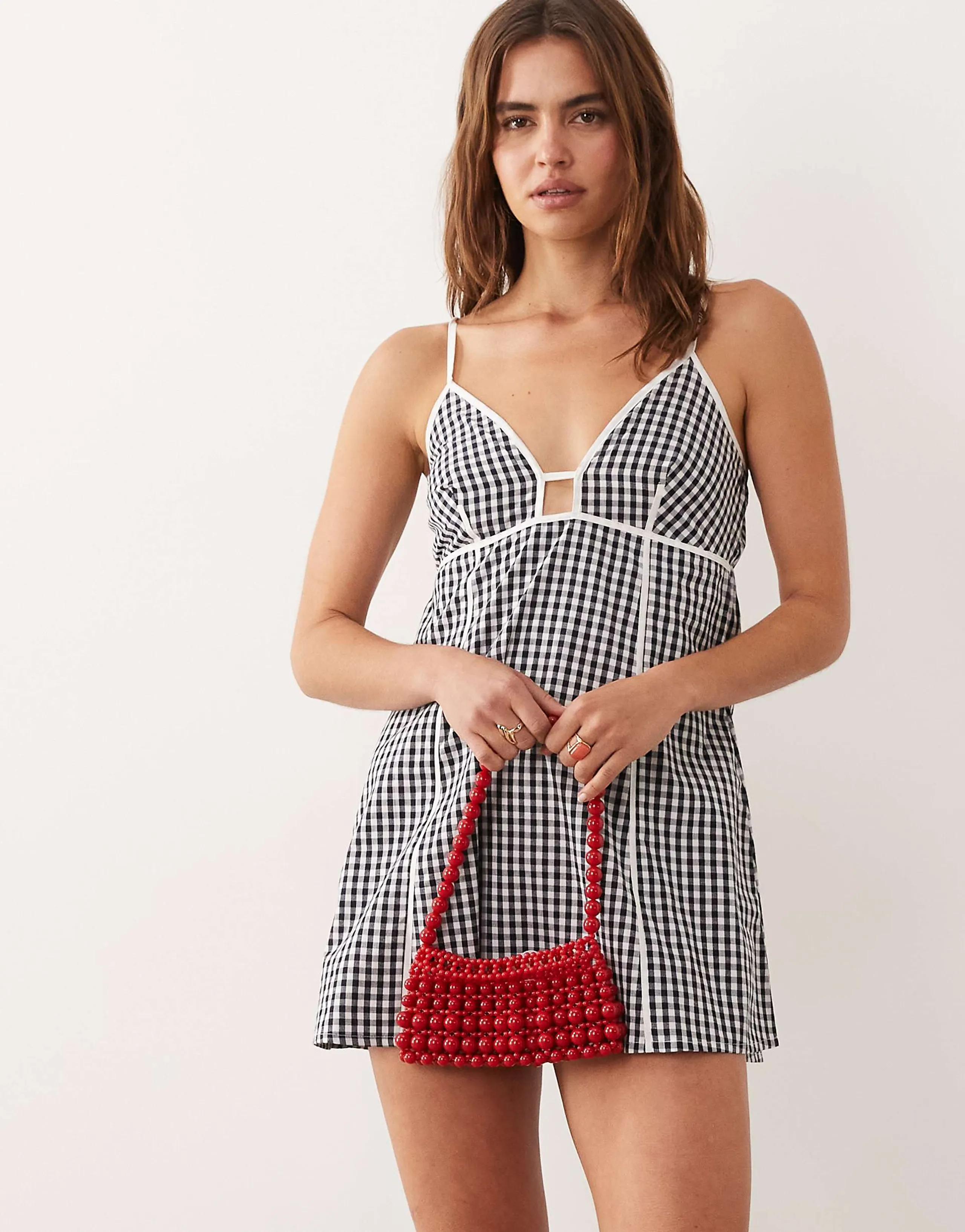 Esmée mini beach dress with contrast piping in black & white gingham