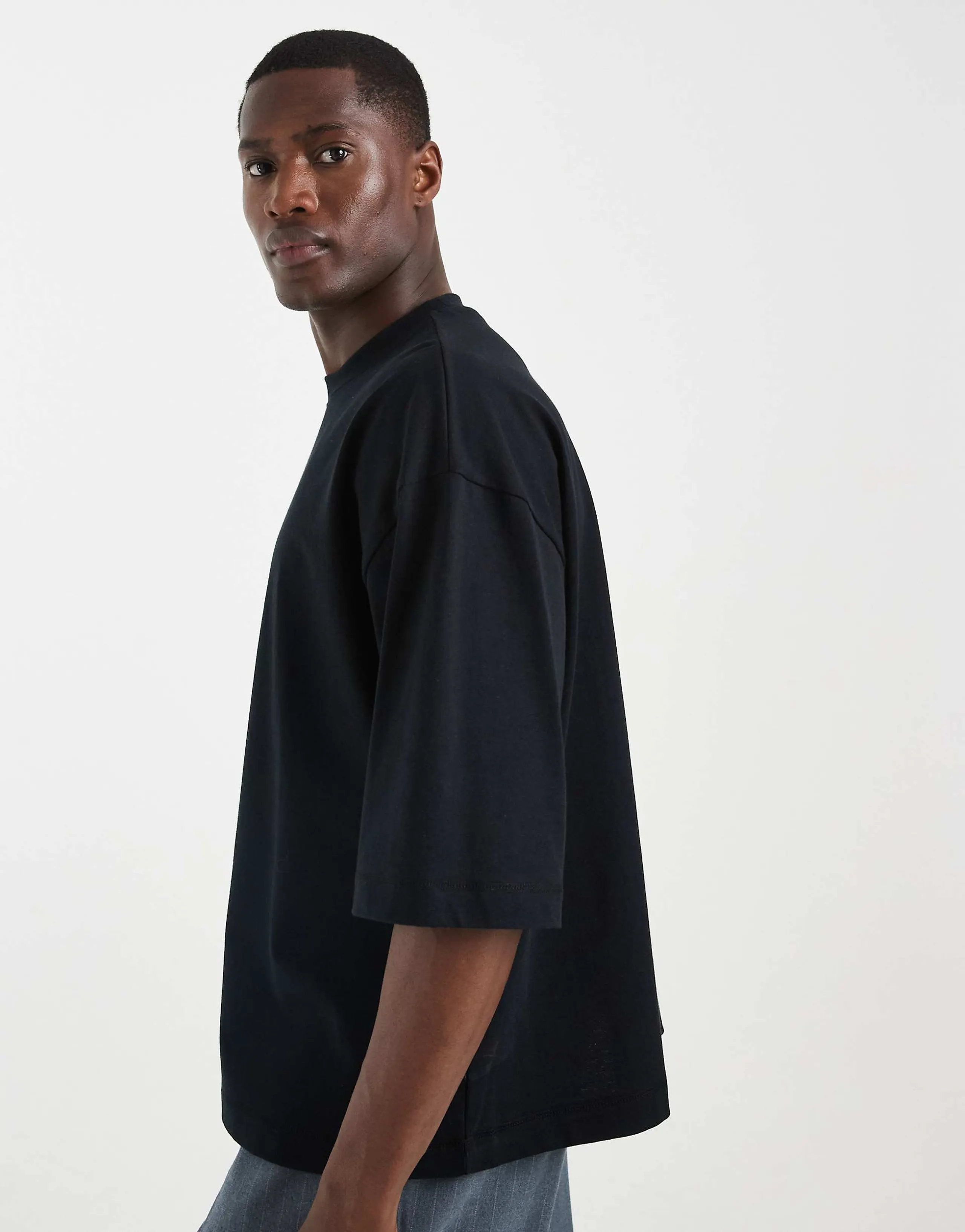ASOS DESIGN heavyweight boxy oversized T-shirt with half sleeve in black