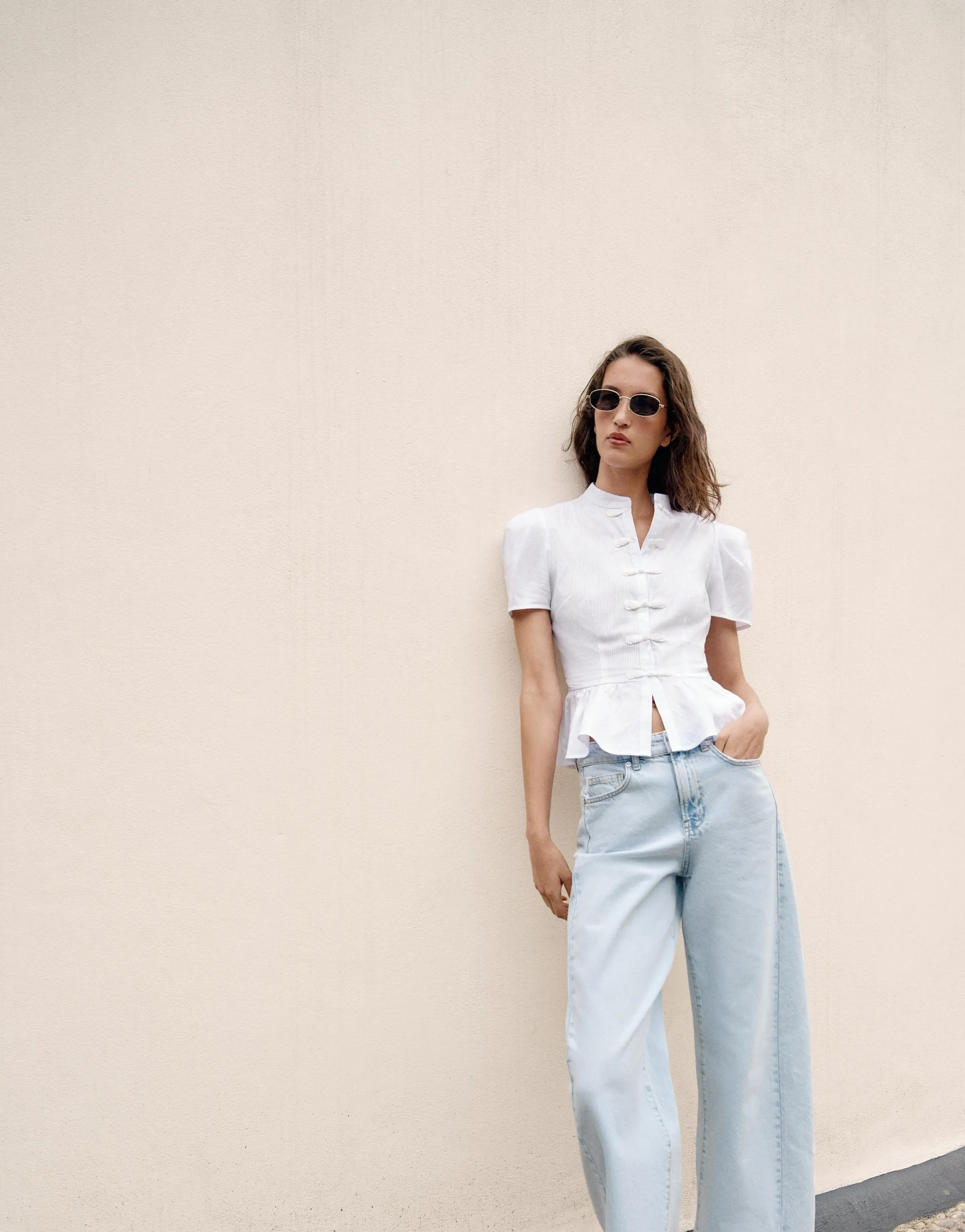 PEPLUM SHIRT WITH FROG FASTENING