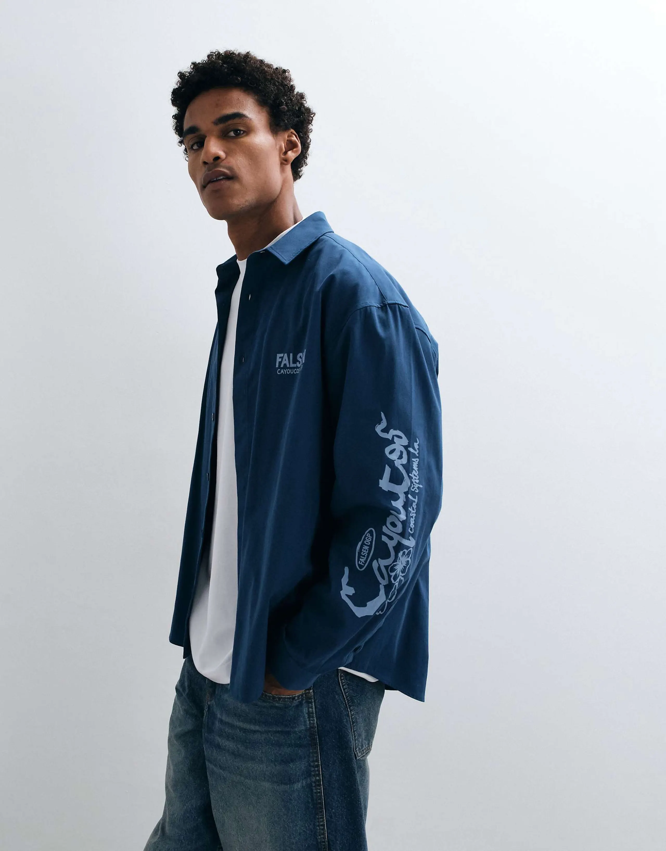 ASOS DESIGN oversized poplin shirt with placement prints in blue
